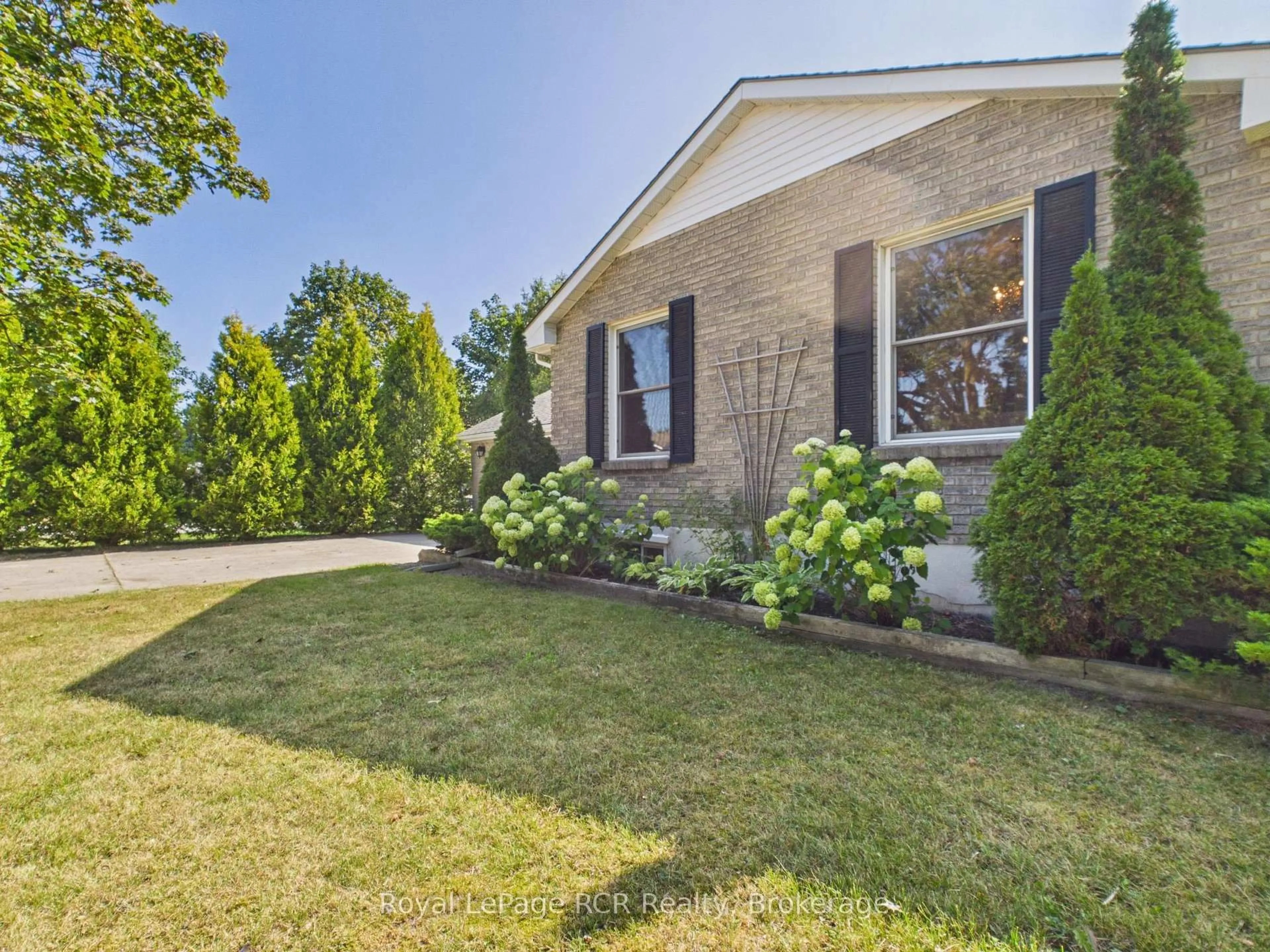 Home with brick exterior material, street for 693 Macyoung Dr, Kincardine Ontario N2Z 1T1