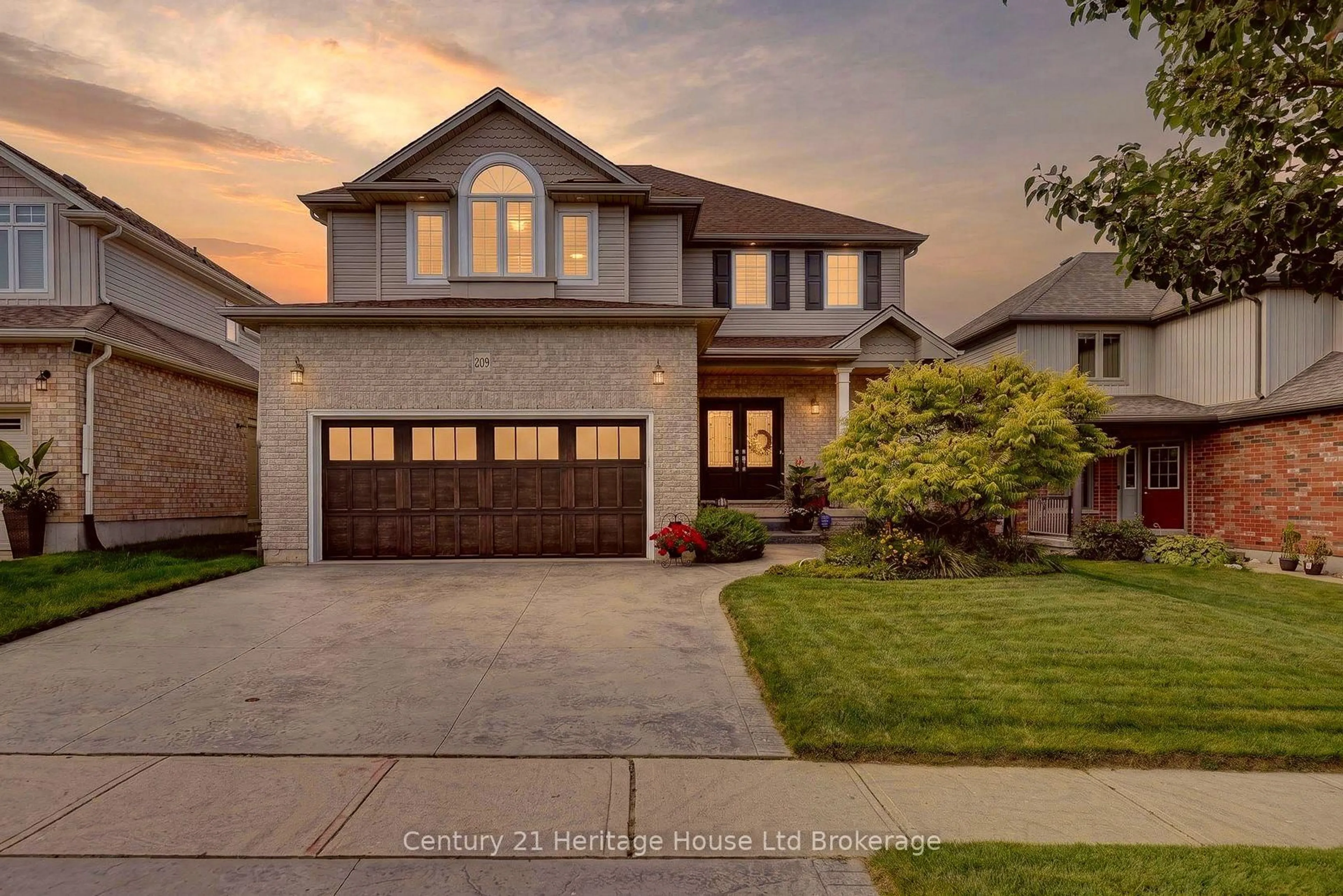 Home with brick exterior material, street for 209 Munnoch Blvd, Woodstock Ontario N4T 1V7
