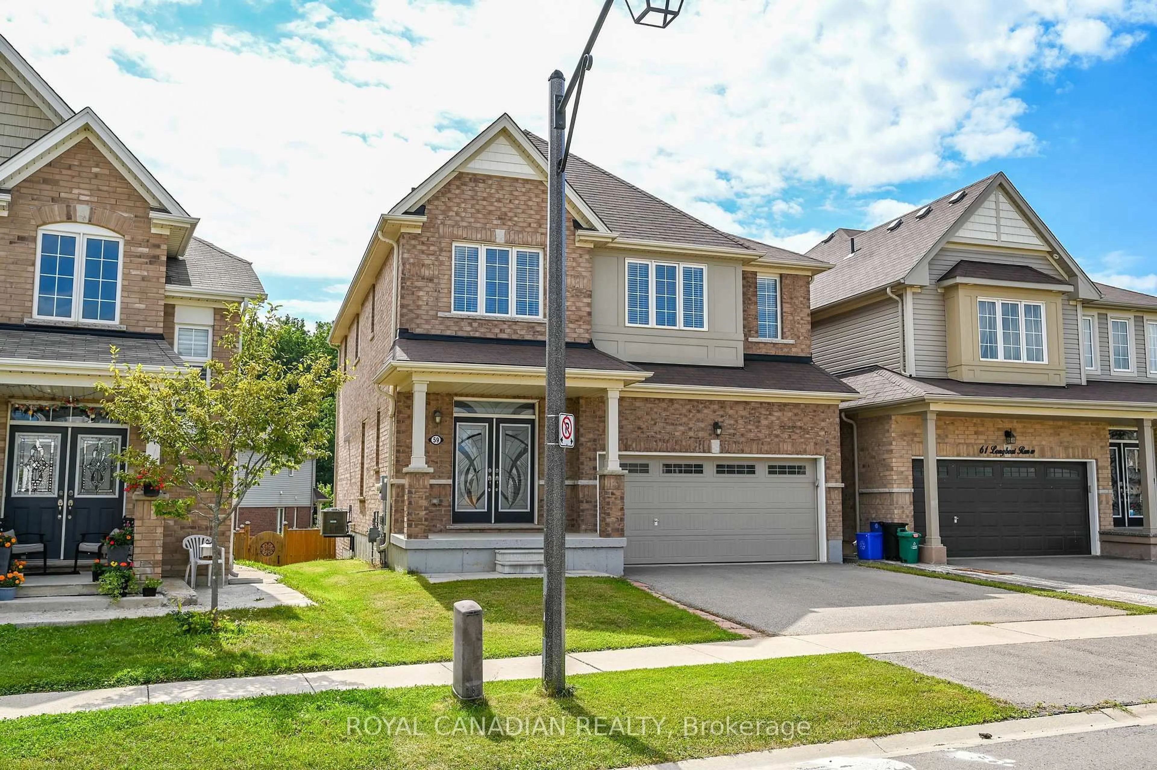 Home with brick exterior material, street for 59 Longboat Ru, Brantford Ontario N3T 0P5