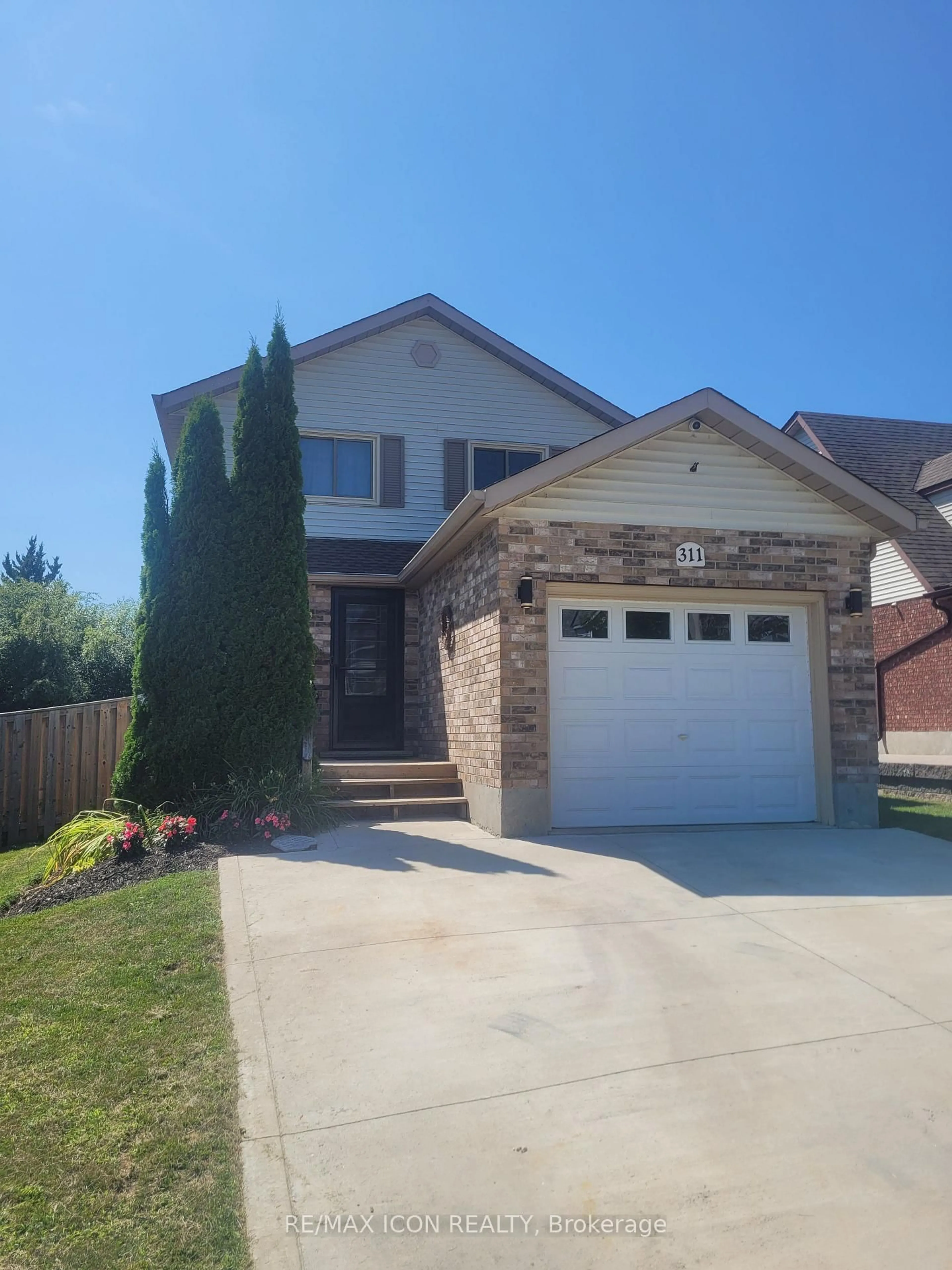 Home with brick exterior material, street for 311 Misty Cres, Kitchener Ontario N2B 3V4