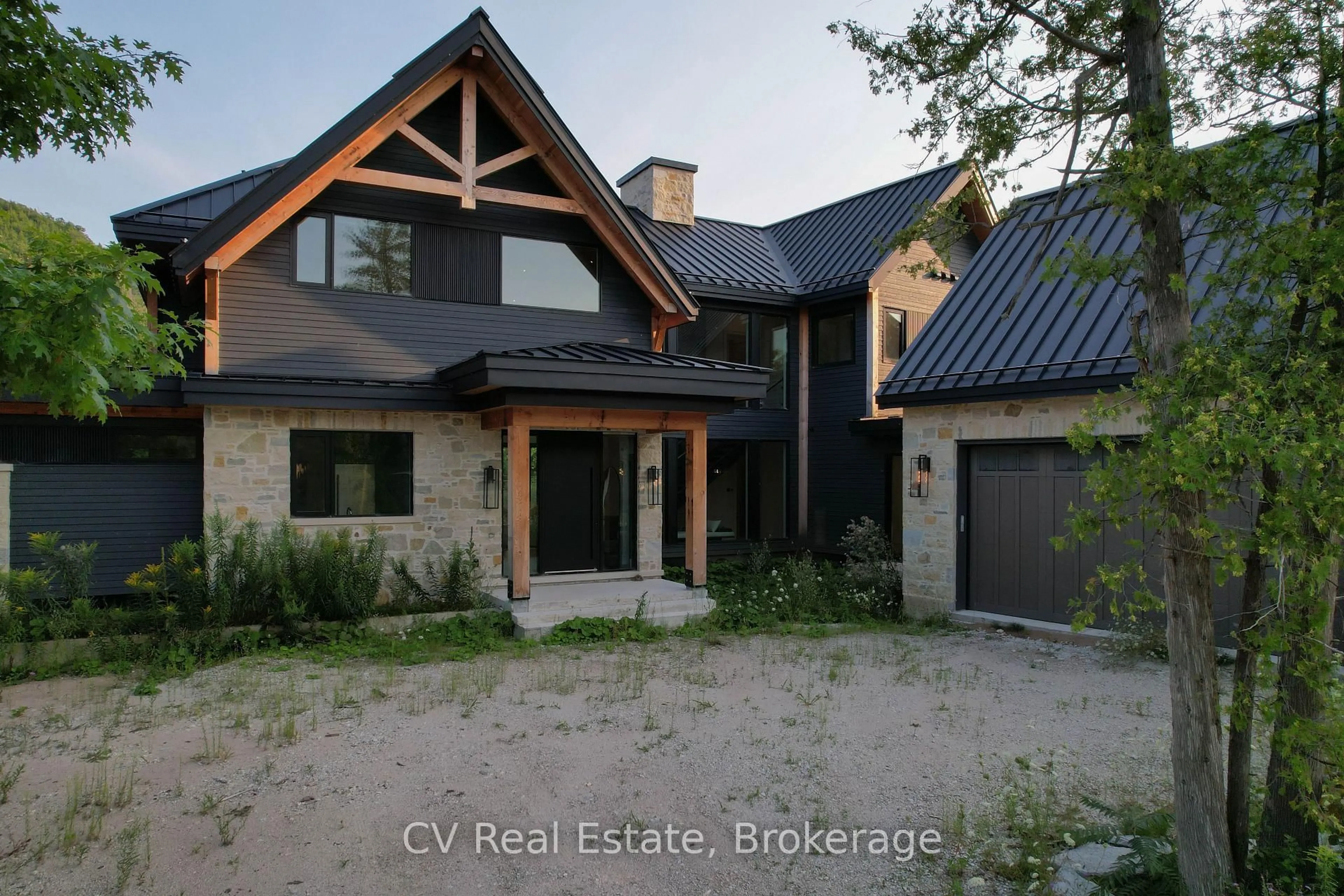 Home with brick exterior material, street for 150 Delphi Lane, Blue Mountains Ontario N0H 1J0