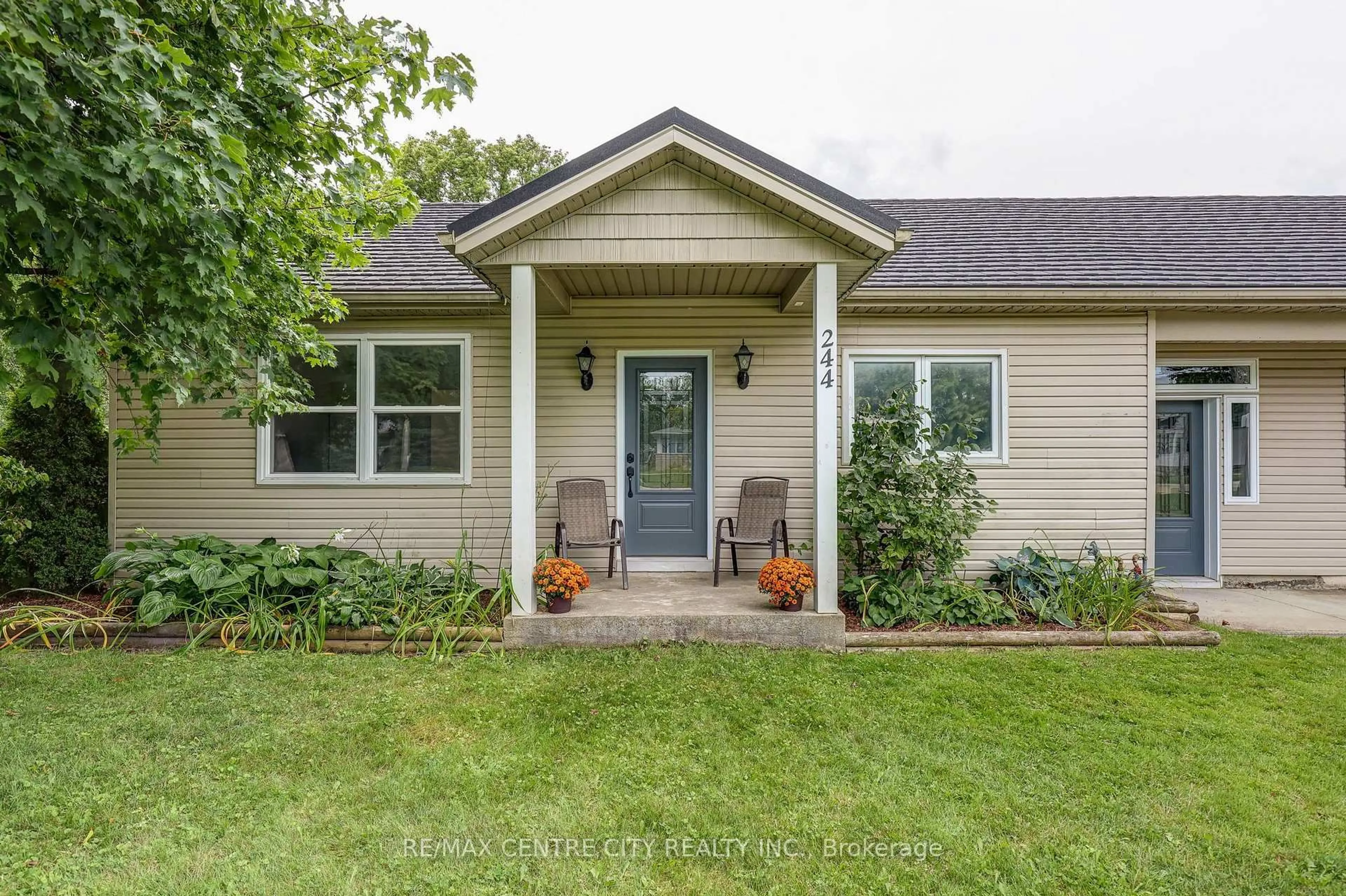 Home with vinyl exterior material, street for 244 CURRIE Rd, Dutton/Dunwich Ontario N0L 1J0
