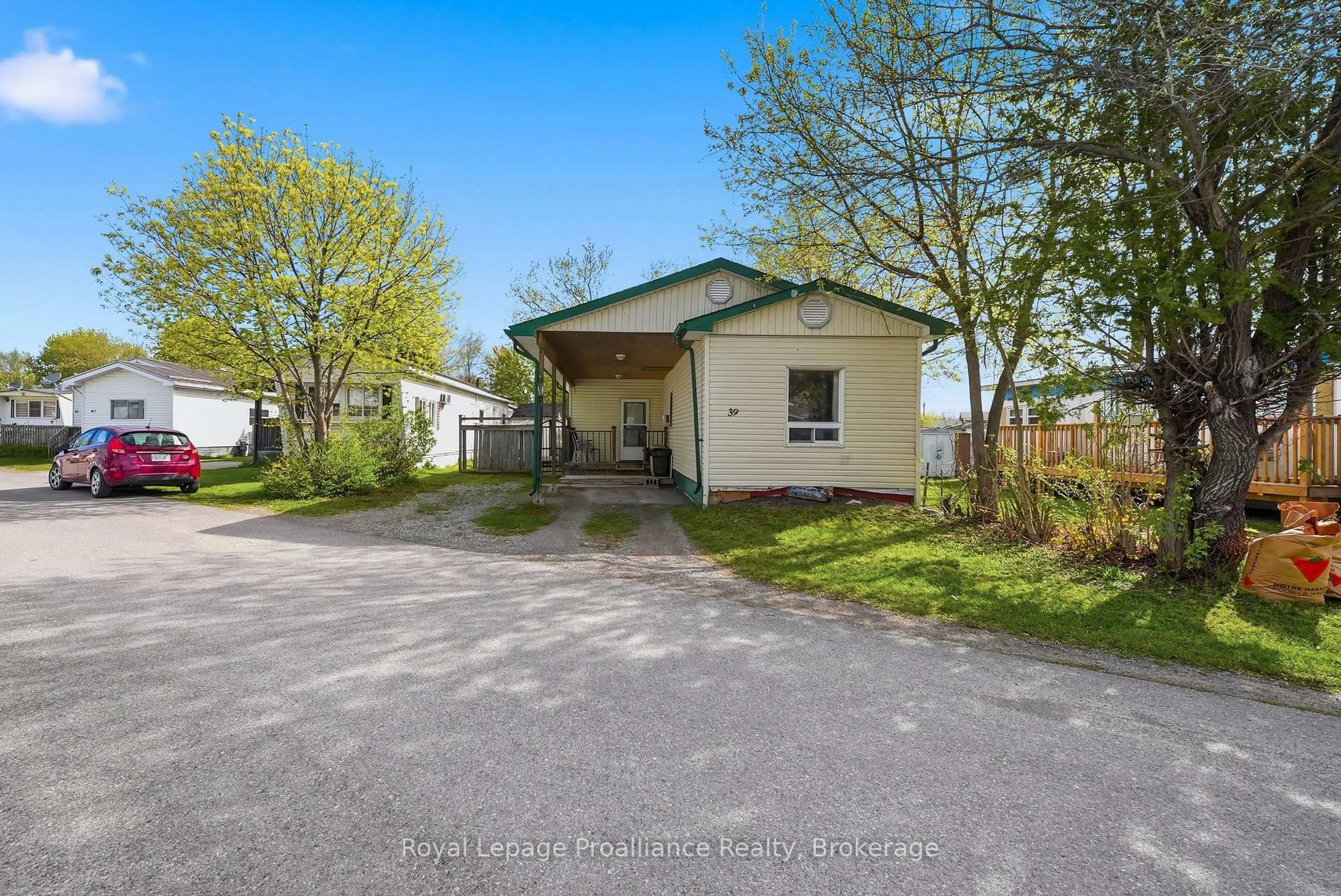 A pic from outside/outdoor area/front of a property/back of a property/a pic from drone, street for 63 Whites Rd #39, Quinte West Ontario K8V 5P5