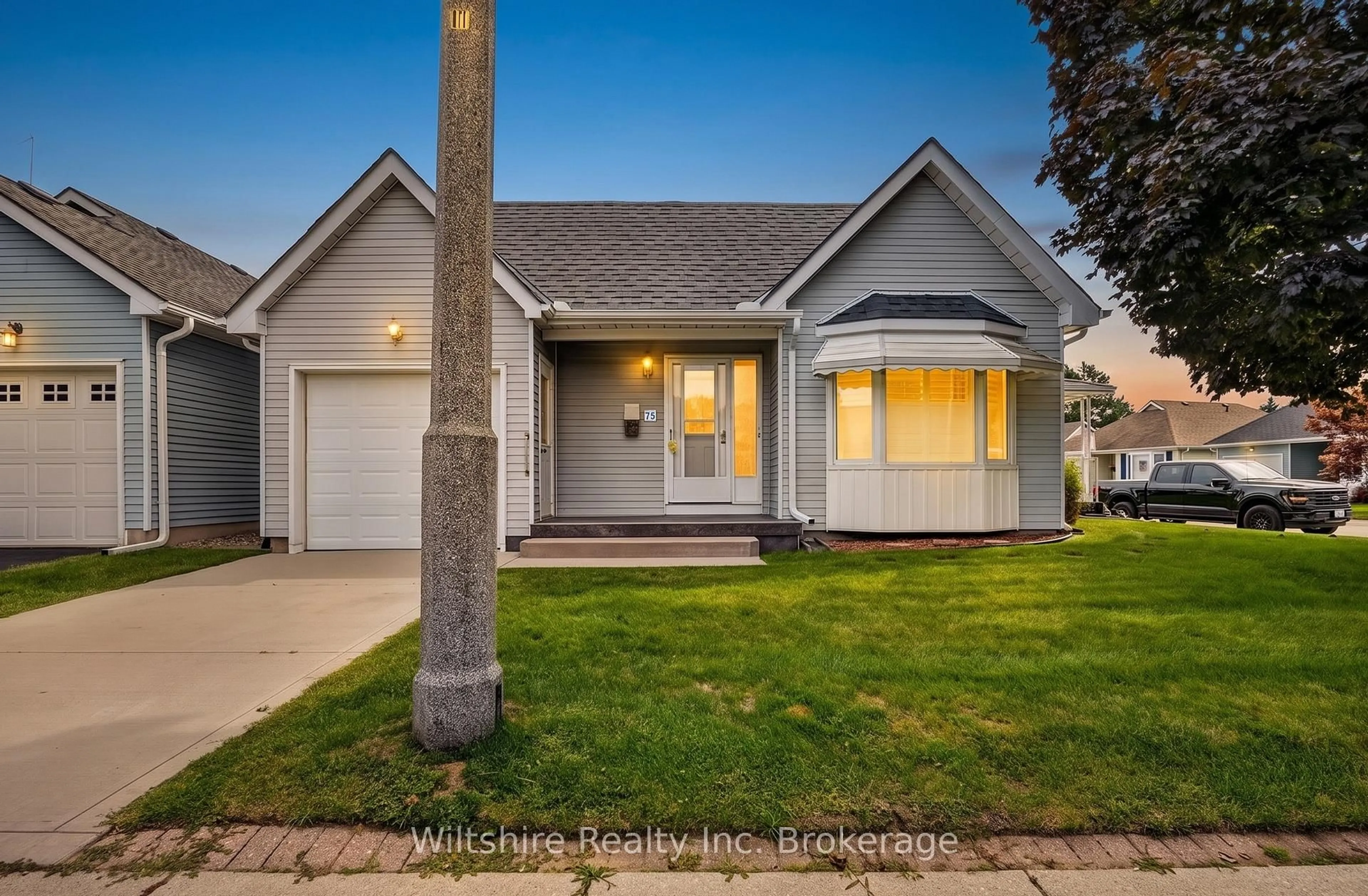 Home with vinyl exterior material, street for 75 Edwin Cres, Tillsonburg Ontario N4G 5H2