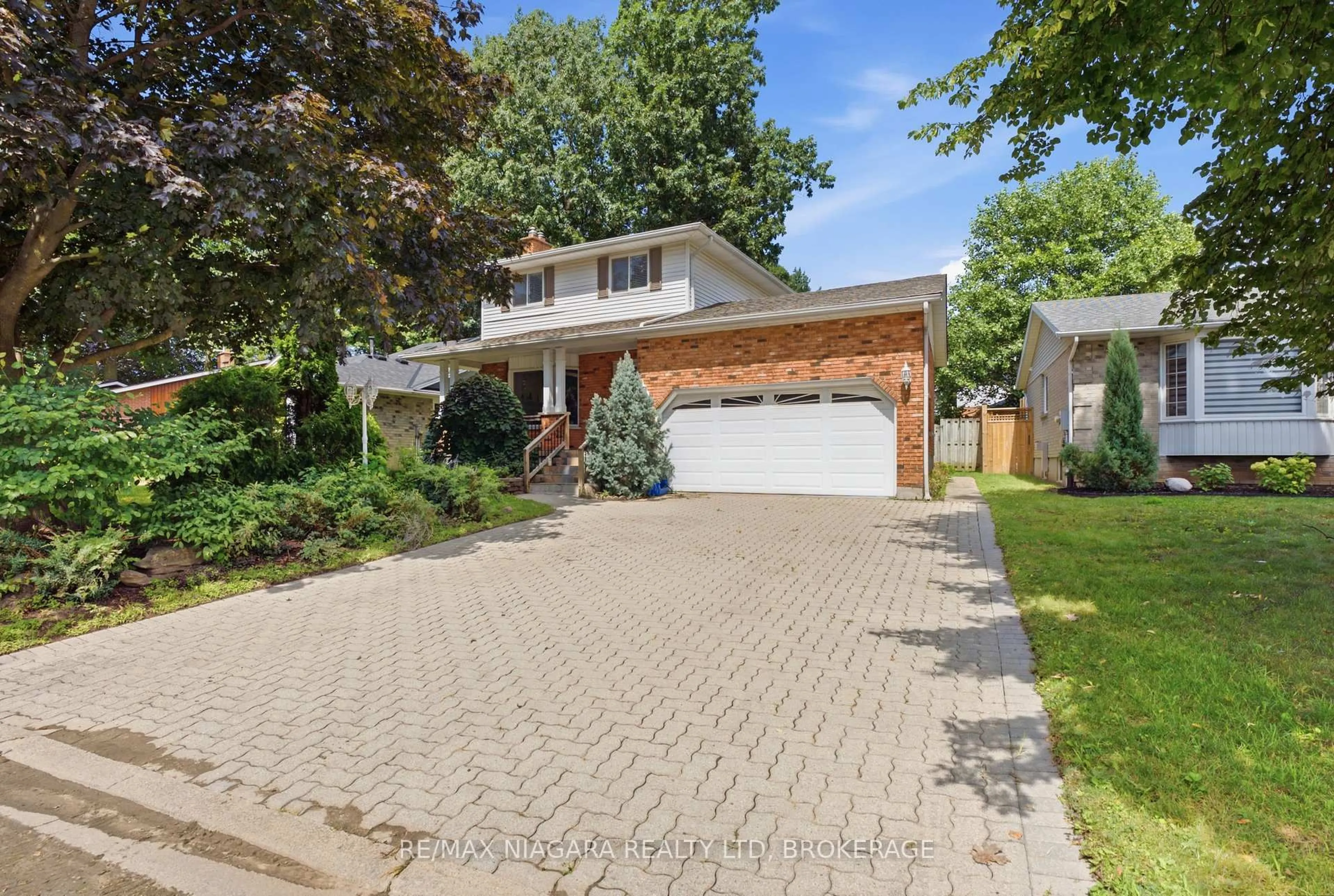 Home with brick exterior material, street for 7435 Petrullo Crt, Niagara Falls Ontario L2H 2K4