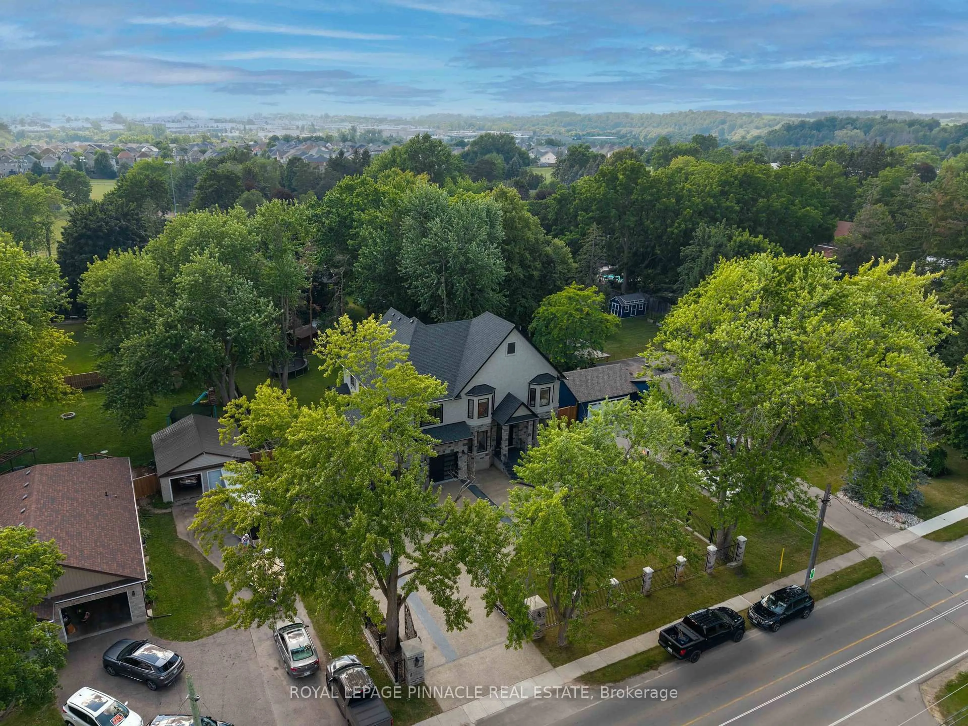 A pic from outside/outdoor area/front of a property/back of a property/a pic from drone, city buildings view from balcony for 138 Woolwich St, Woolwich Ontario N0B 1M0