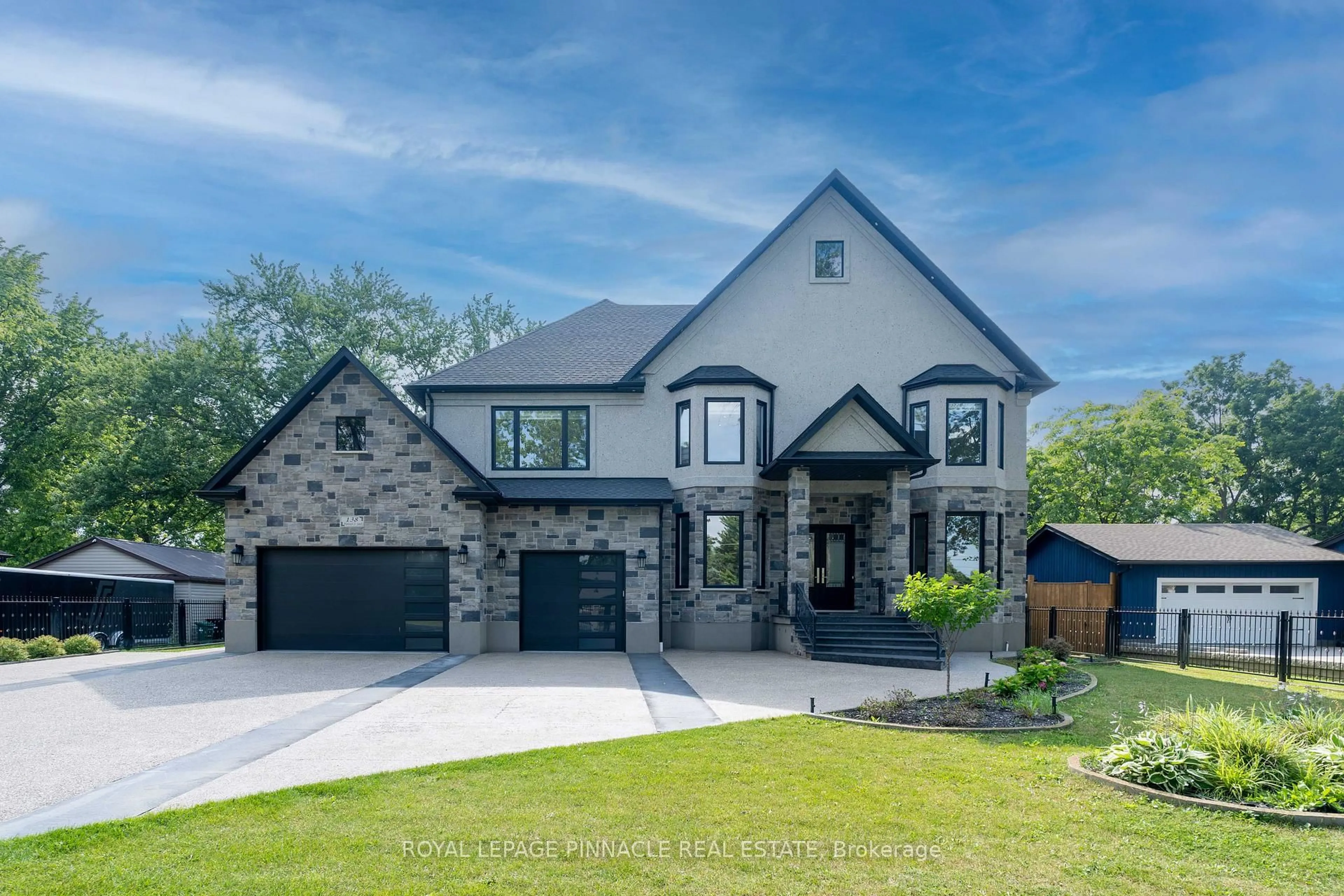 Home with brick exterior material, street for 138 Woolwich St, Woolwich Ontario N0B 1M0