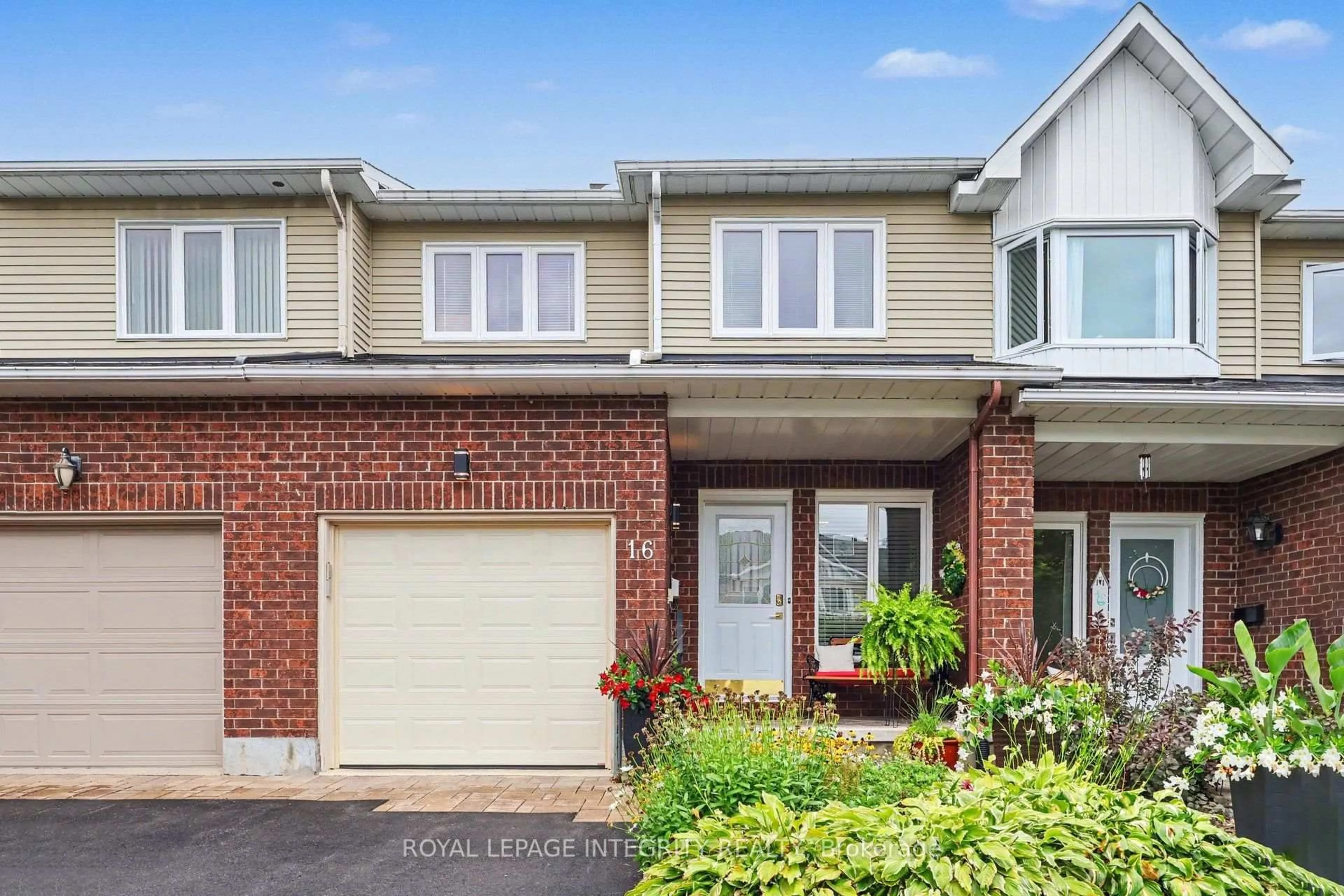 Home with brick exterior material, street for 16 Streamwood Lane, Ottawa Ontario K1T 3R1