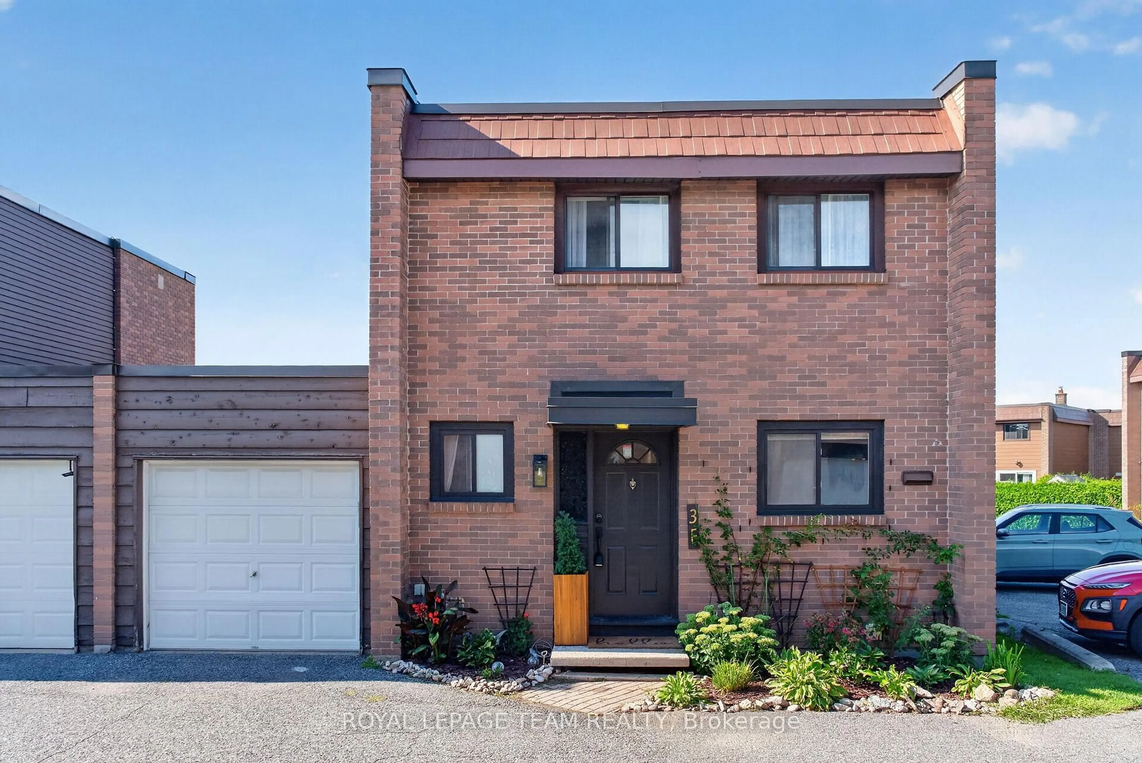 Home with brick exterior material, street for 3 ARNOLD Dr #F, Ottawa Ontario K2H 6V6