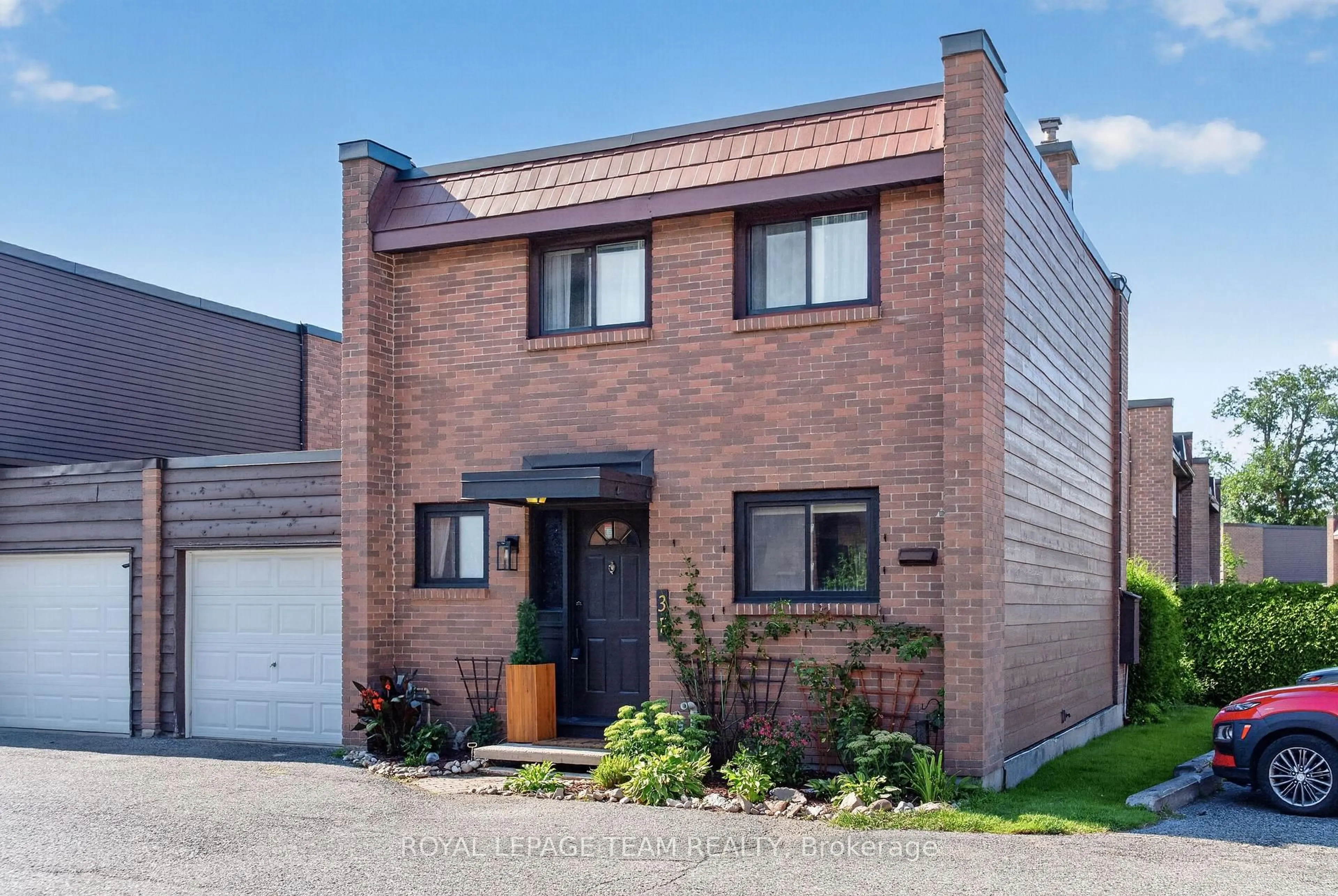 Home with brick exterior material, street for 3 ARNOLD Dr #F, Ottawa Ontario K2H 6V6