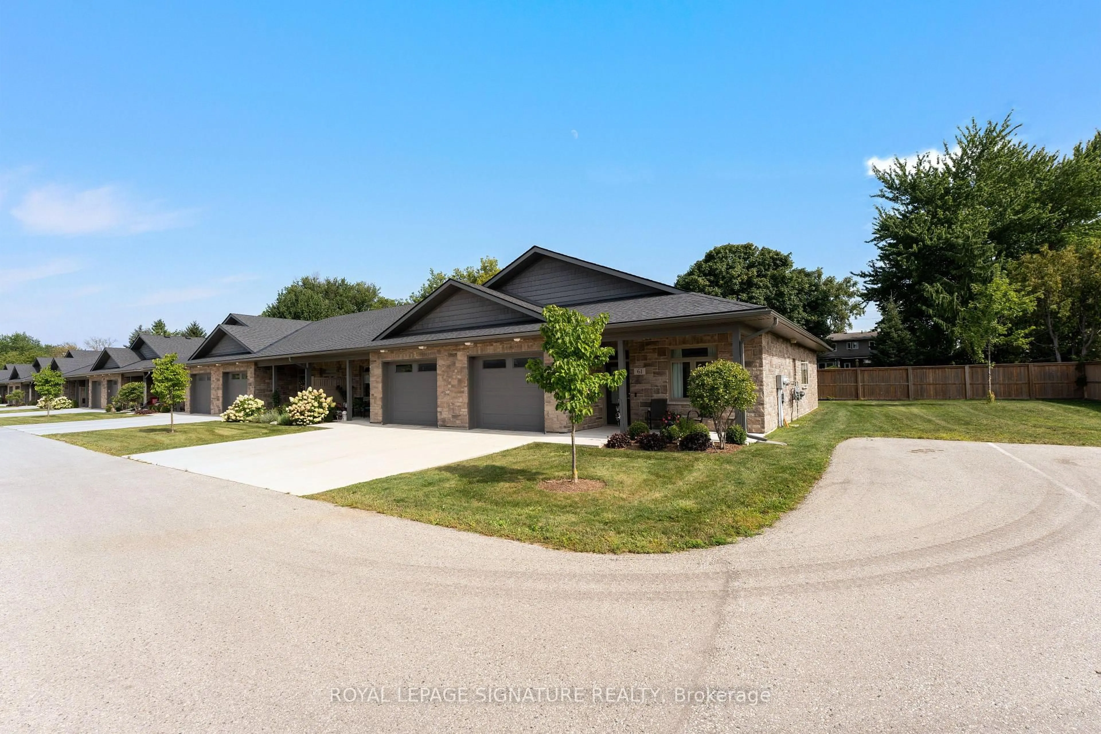 A pic from outside/outdoor area/front of a property/back of a property/a pic from drone, street for 375 Mitchell Rd #61, North Perth Ontario N4W 0H4