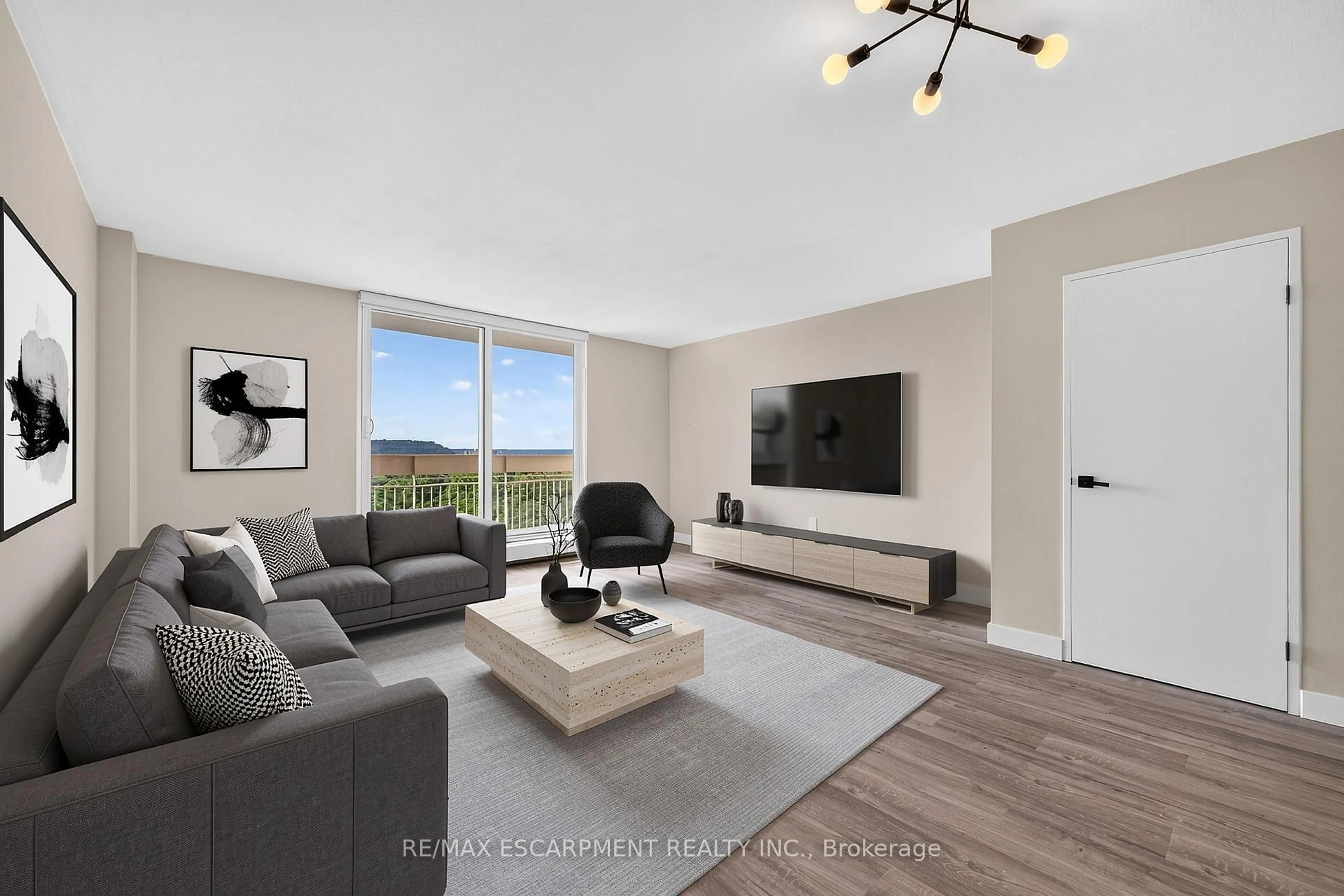Living room with furniture, unknown for 350 Quigley Rd #741, Hamilton Ontario L8K 5N2