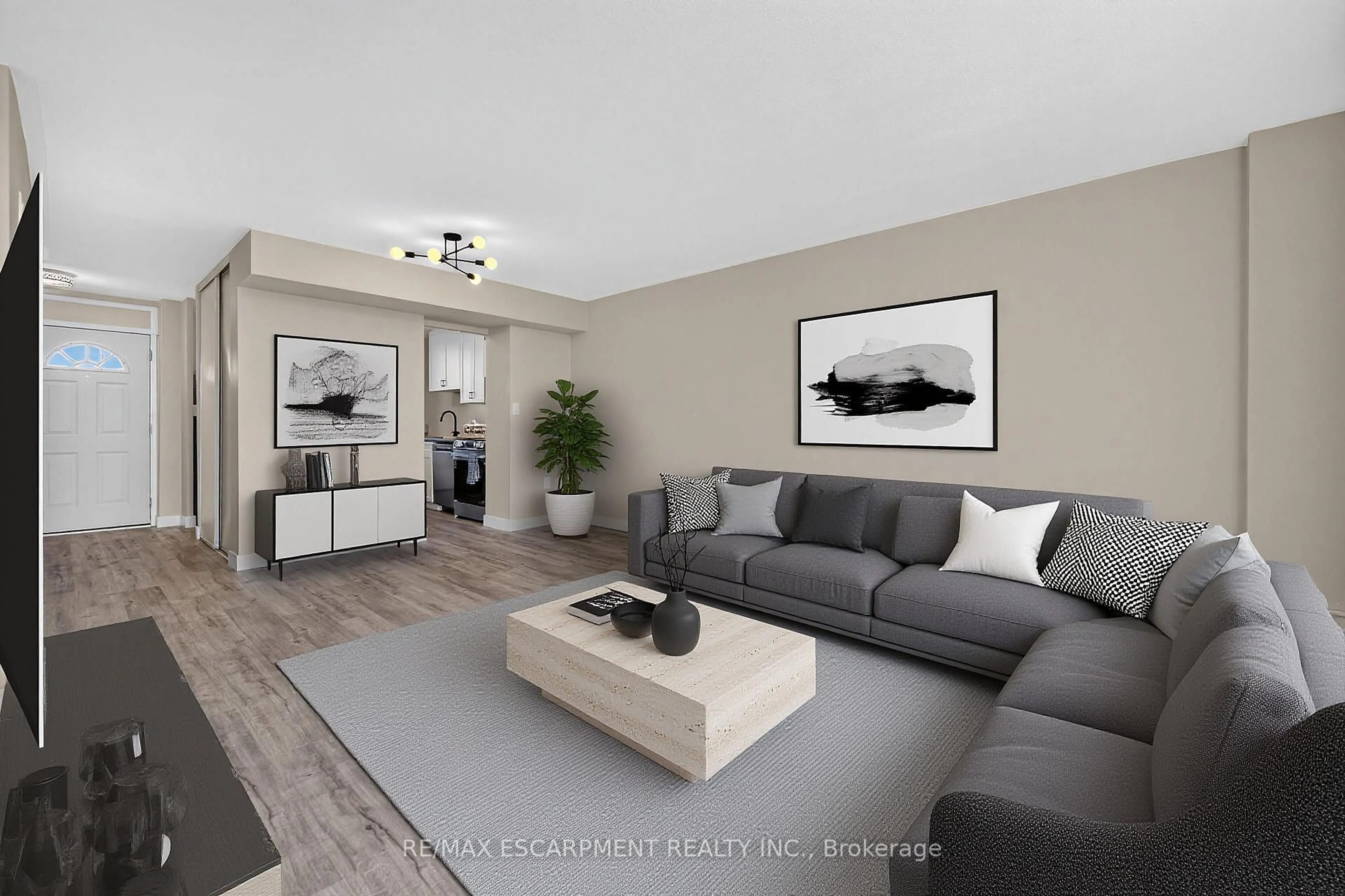 Living room with furniture, unknown for 350 Quigley Rd #741, Hamilton Ontario L8K 5N2
