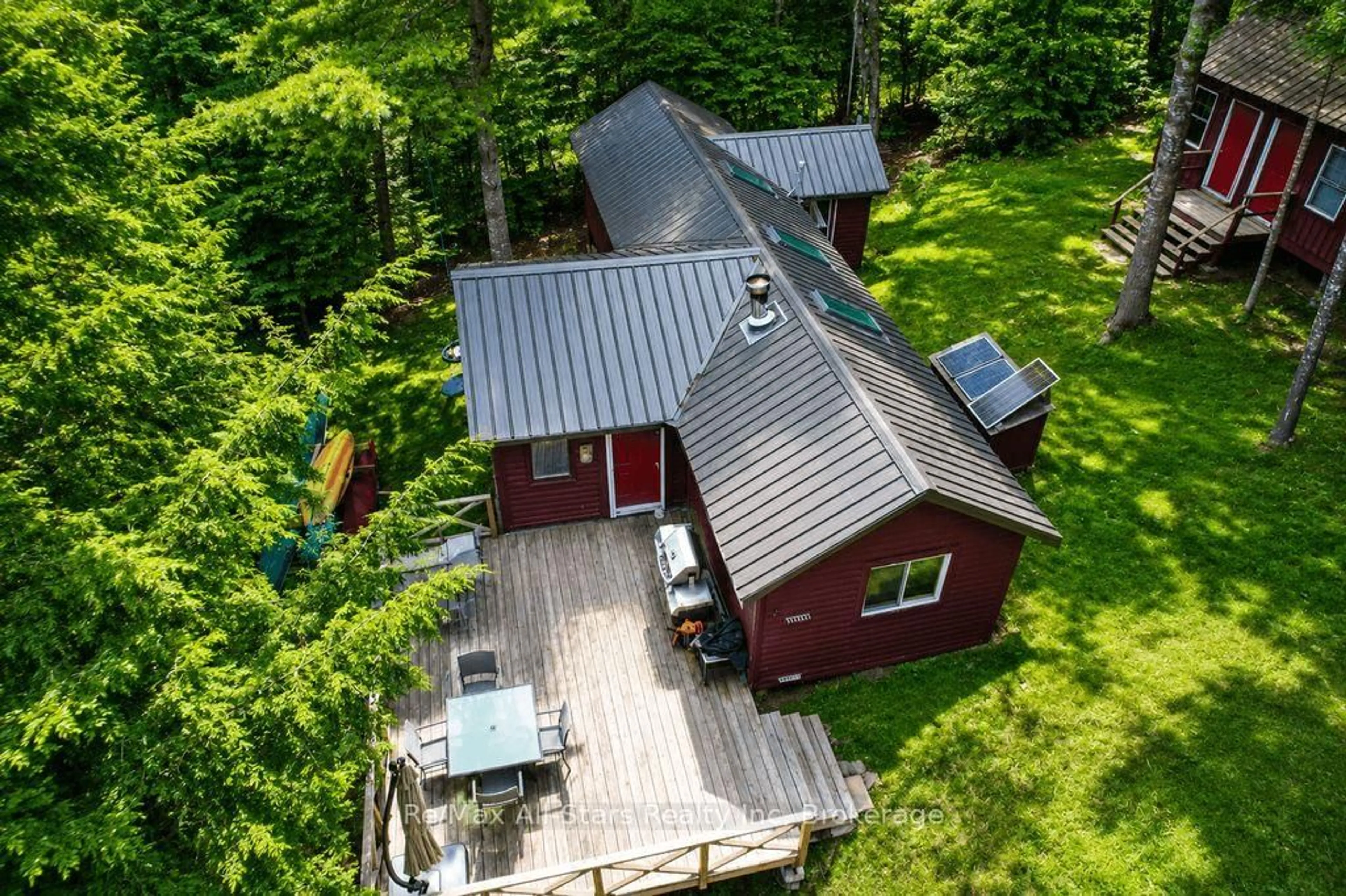A pic from outside/outdoor area/front of a property/back of a property/a pic from drone, forest/trees view for 1142 Smoke Lake, South Algonquin Ontario P0A 1H0