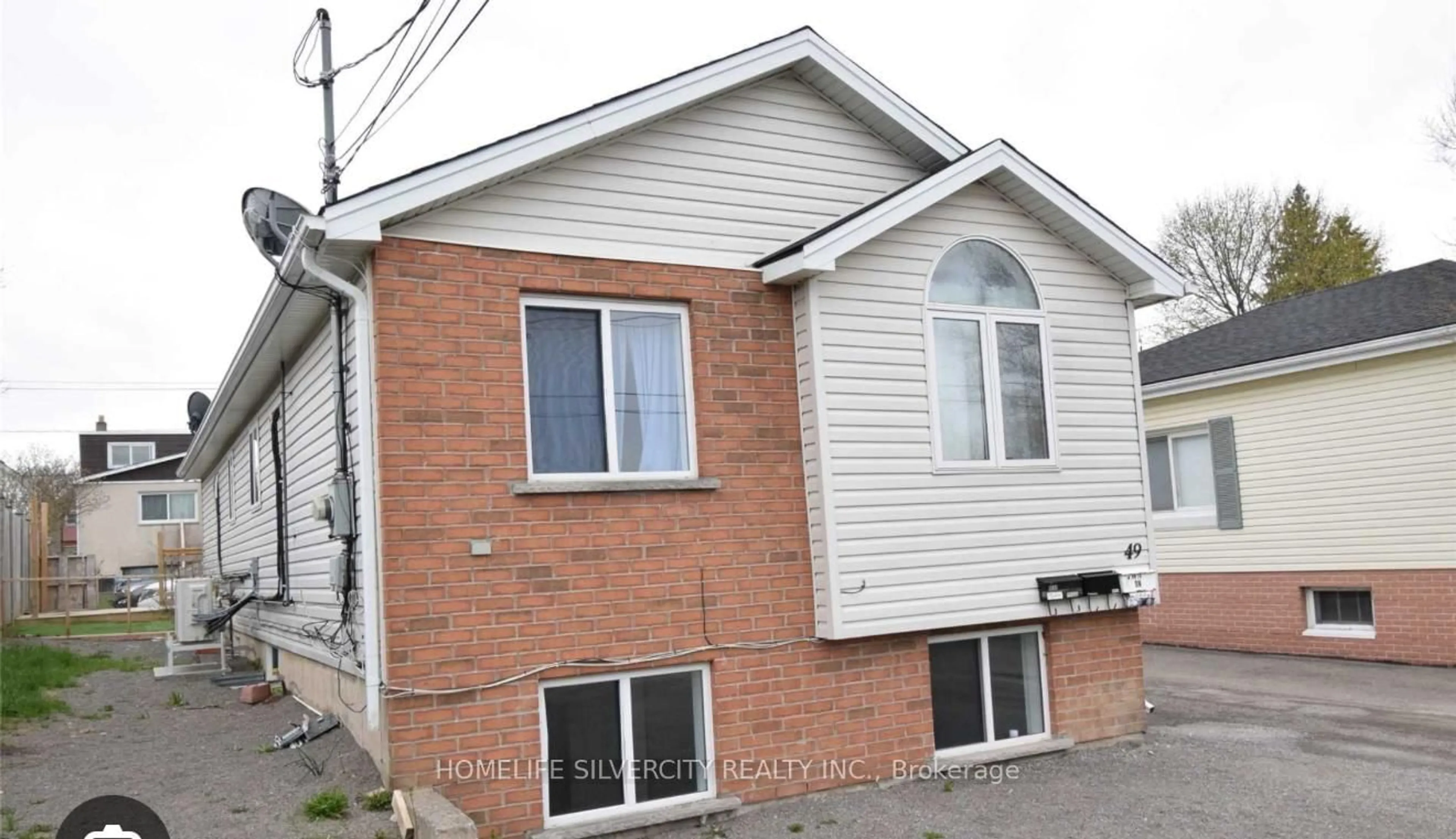 Home with brick exterior material, street for 49 Michael Ave, St. Catharines Ontario L2T 1S2