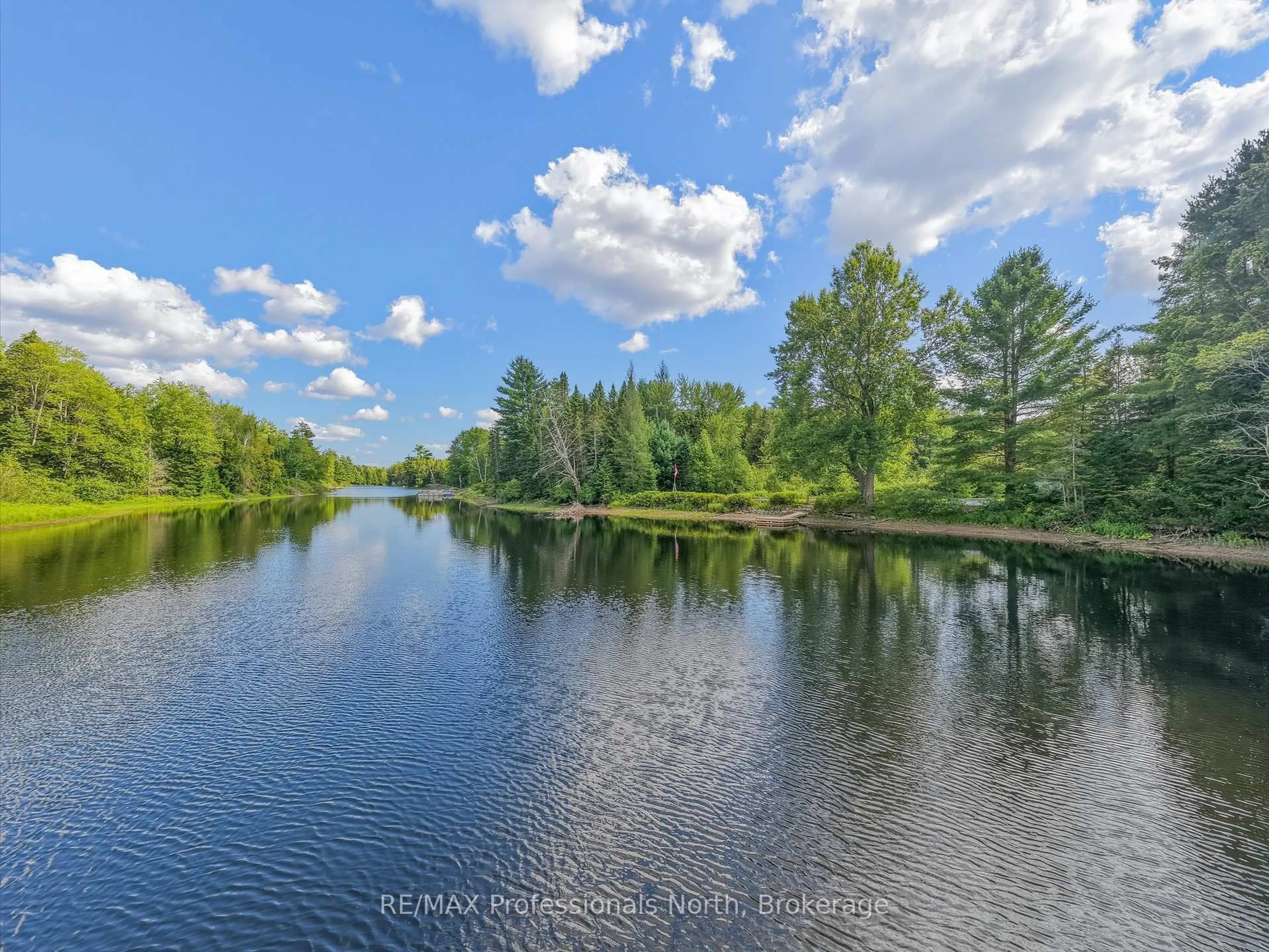 A pic from outside/outdoor area/front of a property/back of a property/a pic from drone, water/lake/river/ocean view for 1001 Sherwood Forest Rd, Bracebridge Ontario P1L 1X3