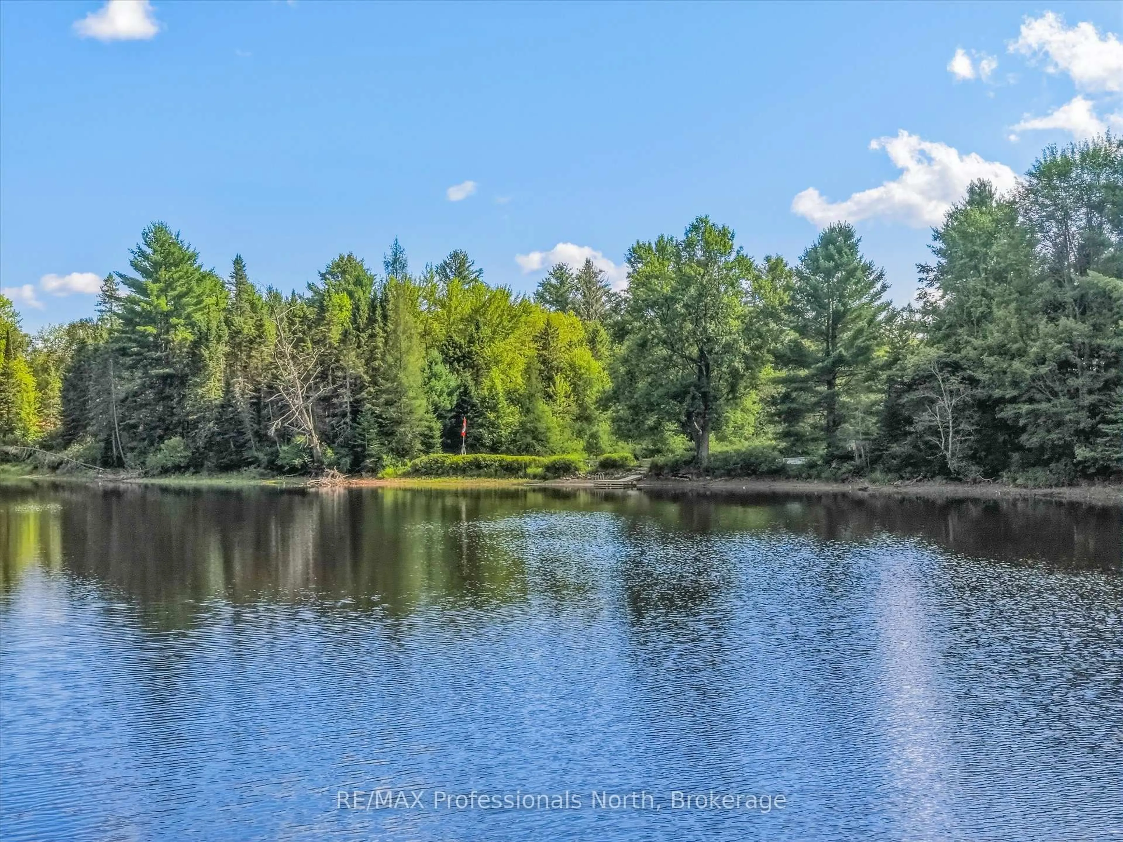 A pic from outside/outdoor area/front of a property/back of a property/a pic from drone, water/lake/river/ocean view for 1001 Sherwood Forest Rd, Bracebridge Ontario P1L 1X3