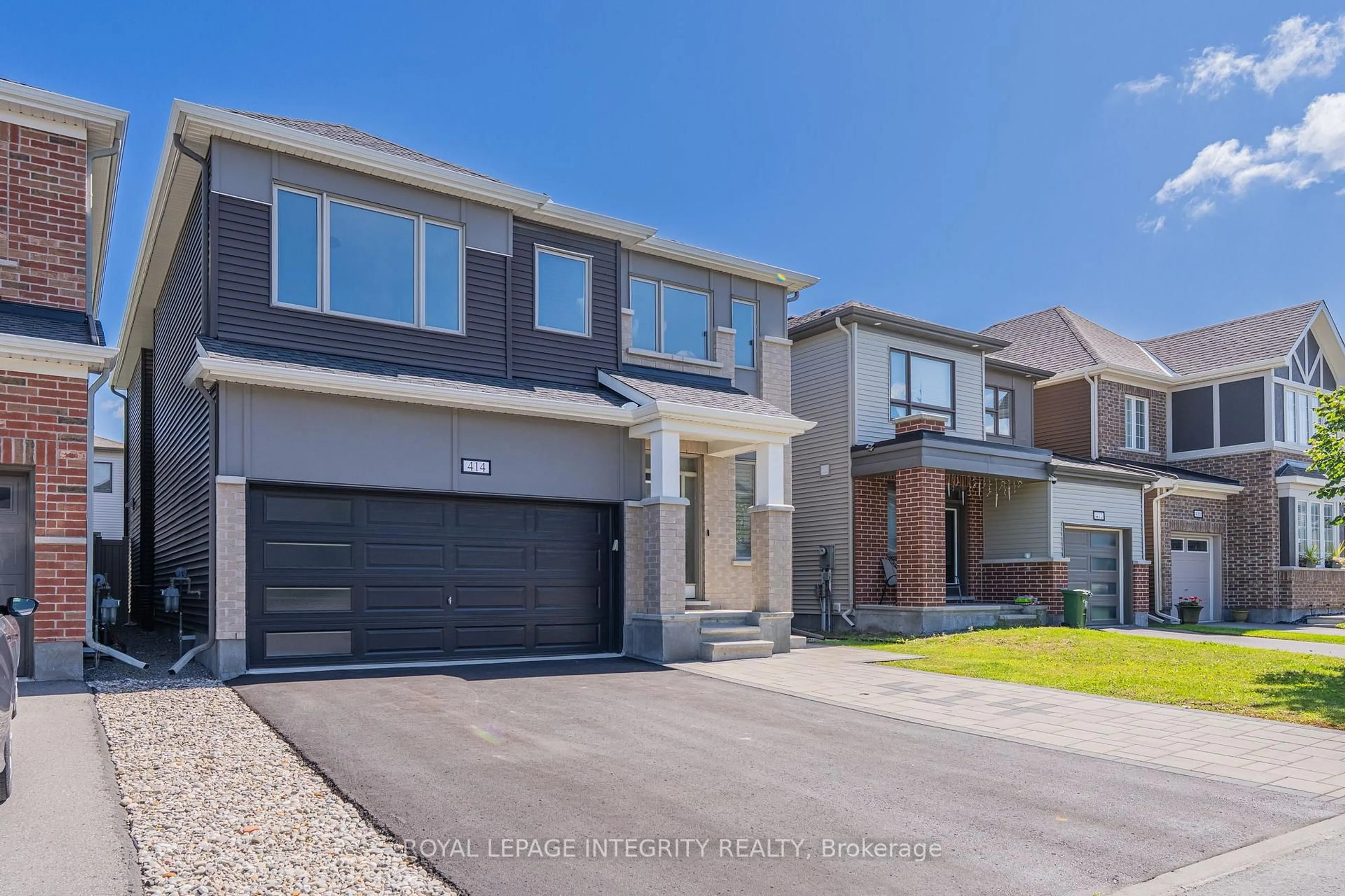 Home with brick exterior material, street for 414 Aphelion Cres, Ottawa Ontario K2J 6N6