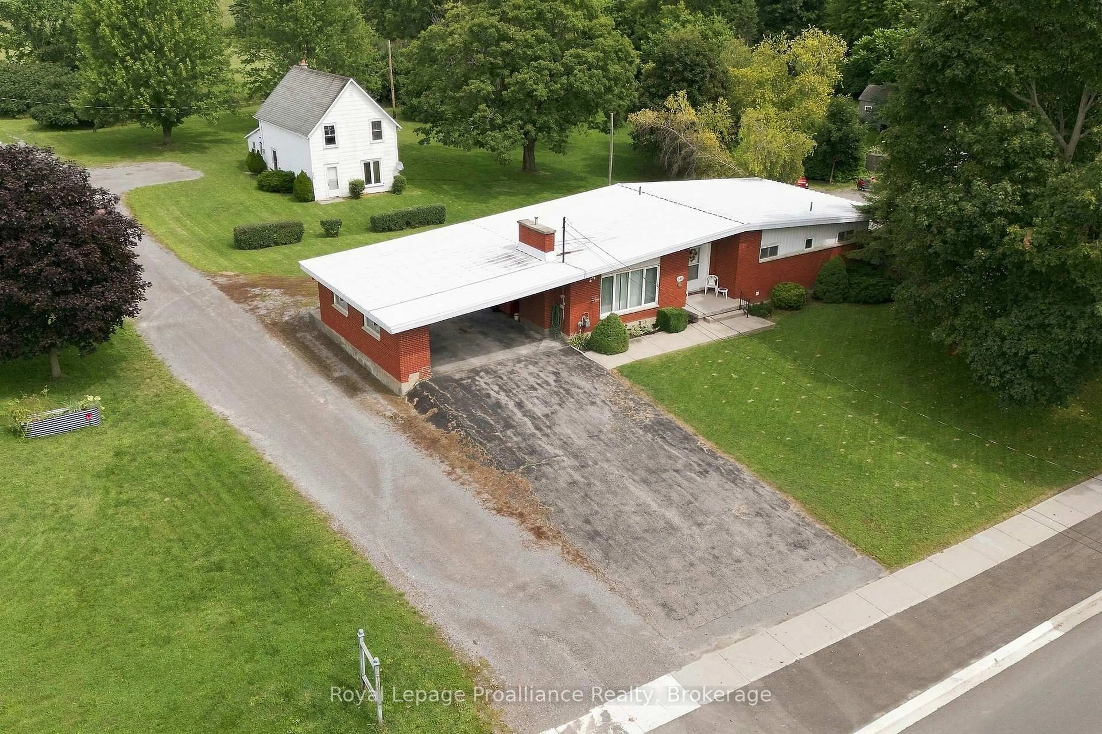 A pic from outside/outdoor area/front of a property/back of a property/a pic from drone, building for 380-384 Main St, Prince Edward County Ontario K0K 1G0