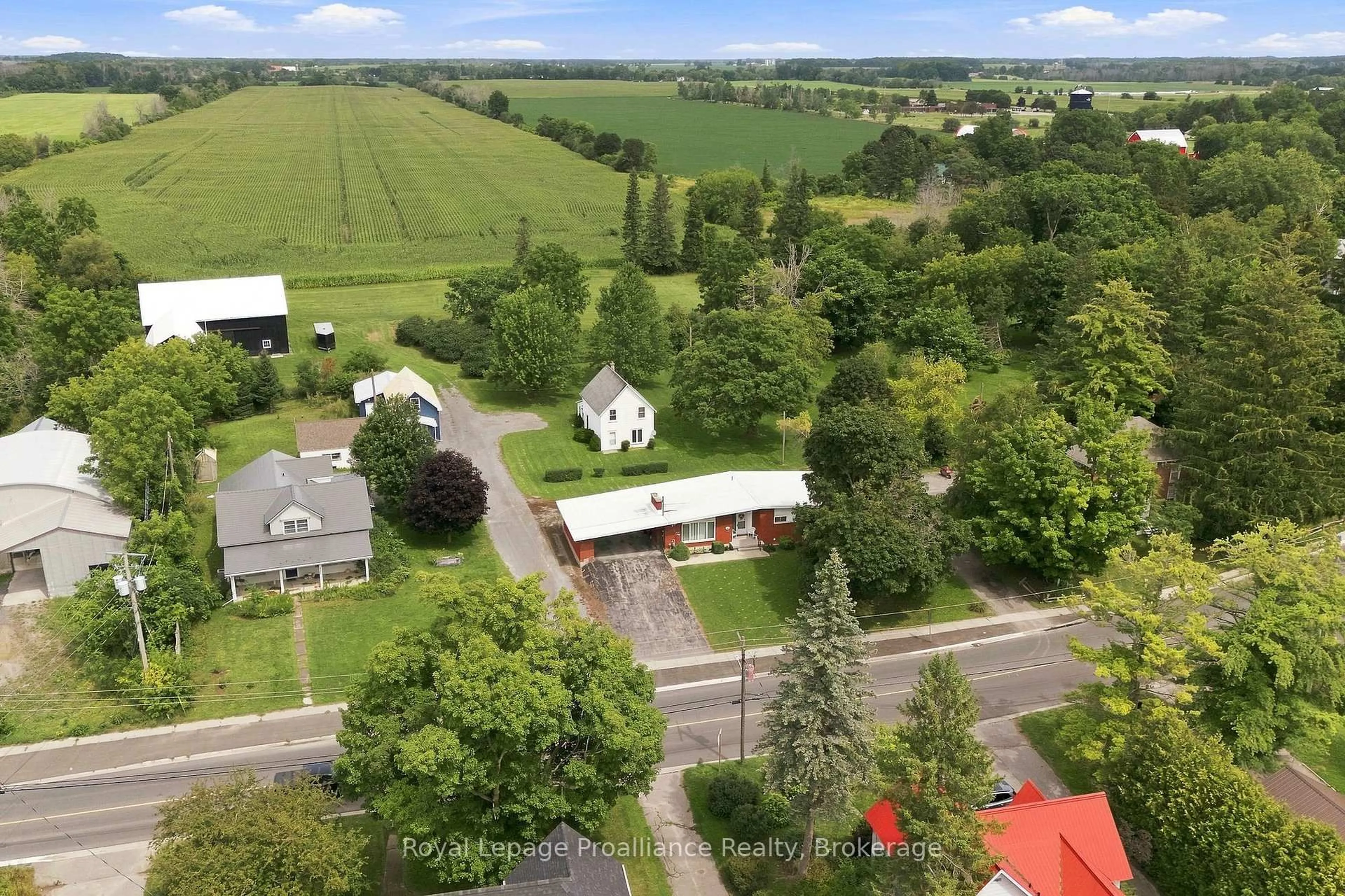 A pic from outside/outdoor area/front of a property/back of a property/a pic from drone, unknown for 380-384 Main St, Prince Edward County Ontario K0K 1G0