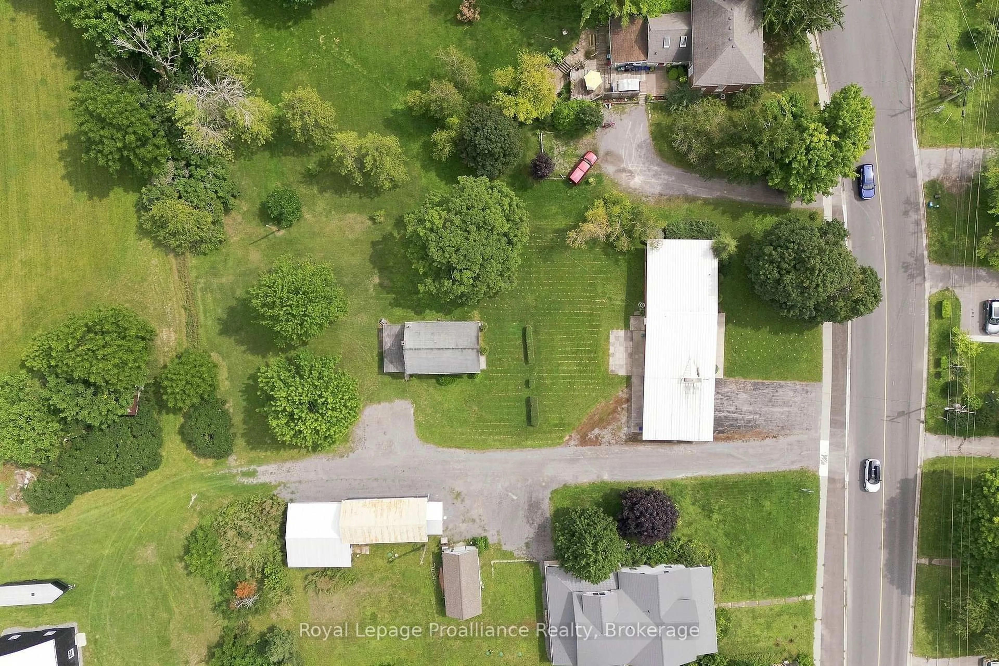 A pic from outside/outdoor area/front of a property/back of a property/a pic from drone, street for 380-384 Main St, Prince Edward County Ontario K0K 1G0