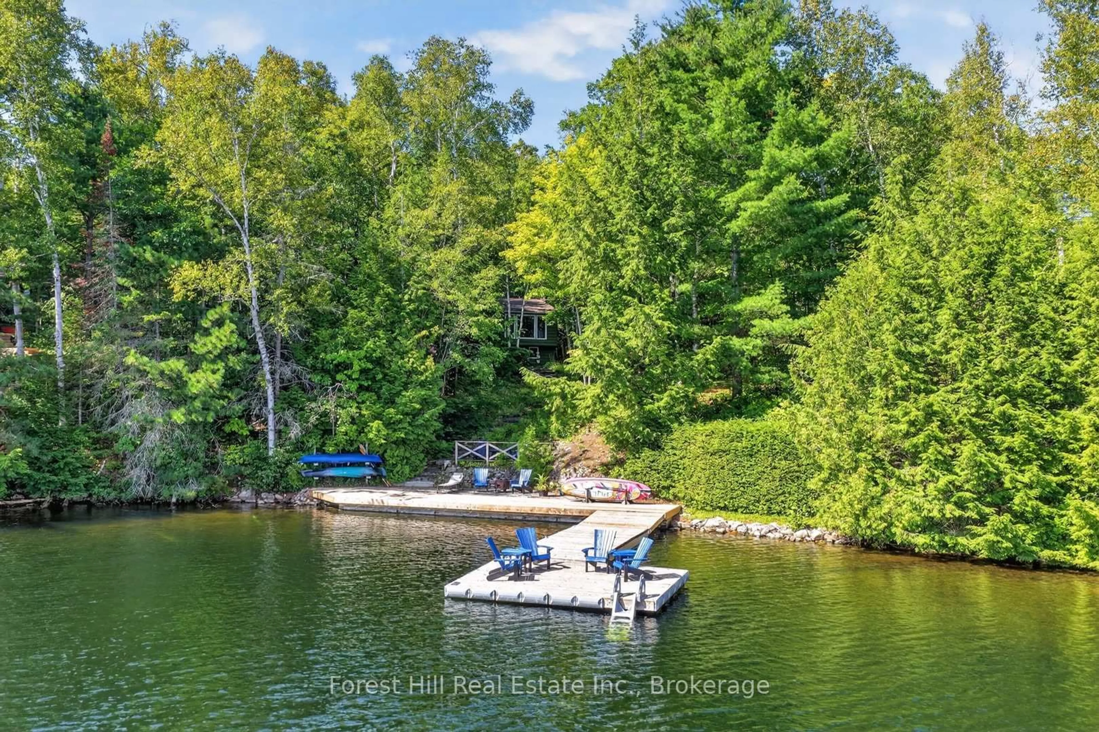 A pic from outside/outdoor area/front of a property/back of a property/a pic from drone, water/lake/river/ocean view for 1208 McComb Point Dr, Algonquin Highlands Ontario P0A 1E0