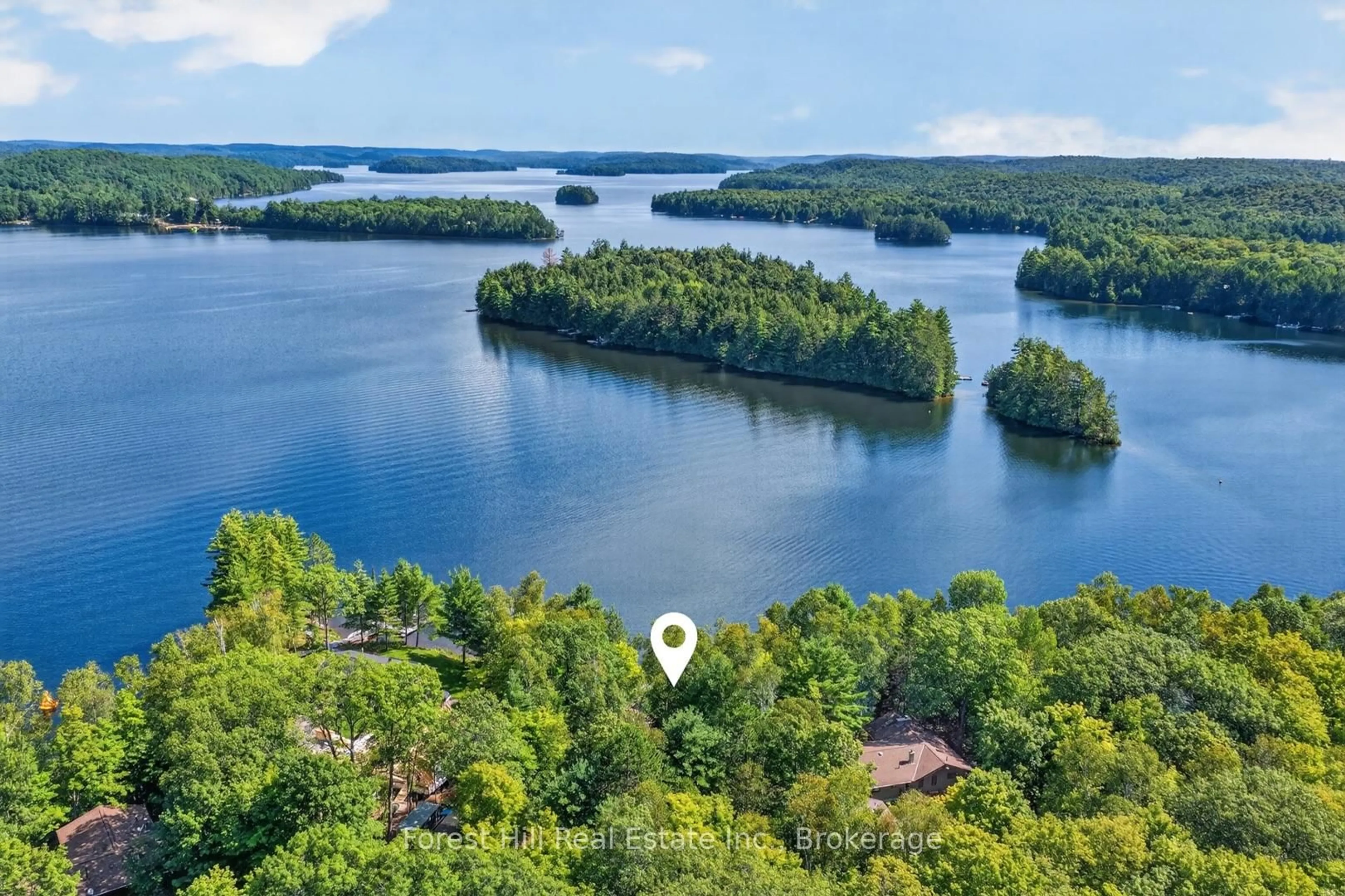 A pic from outside/outdoor area/front of a property/back of a property/a pic from drone, water/lake/river/ocean view for 1208 McComb Point Dr, Algonquin Highlands Ontario P0A 1E0