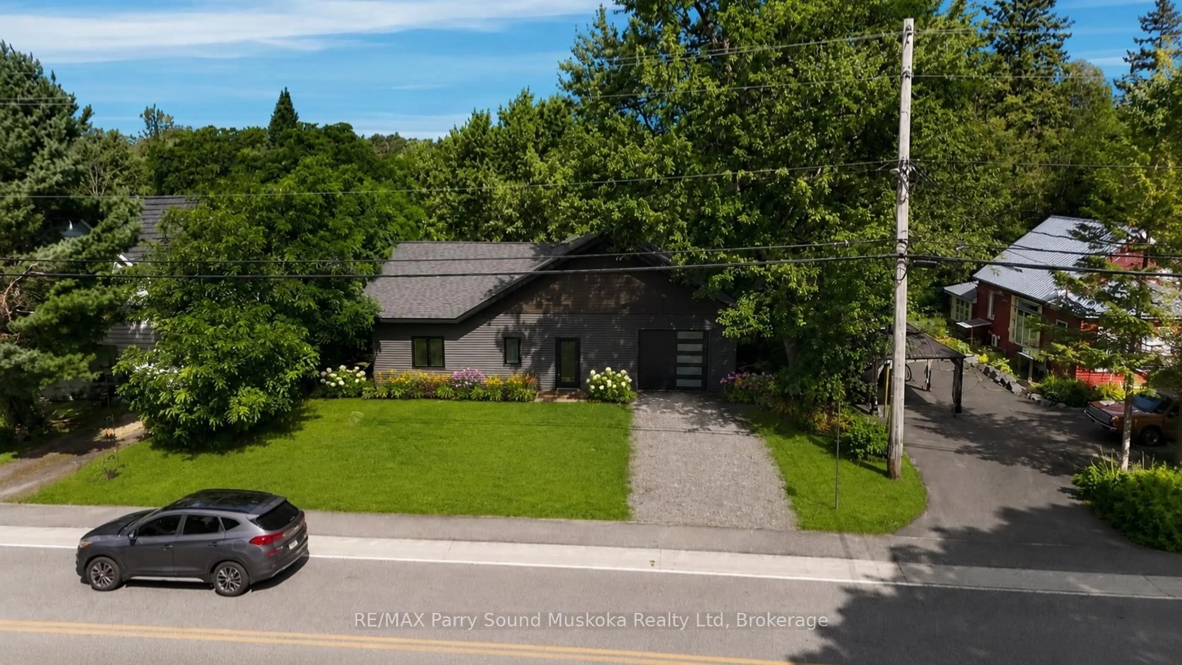 A pic from outside/outdoor area/front of a property/back of a property/a pic from drone, street for 1232 518 Highway, Seguin Ontario P2A 0B6