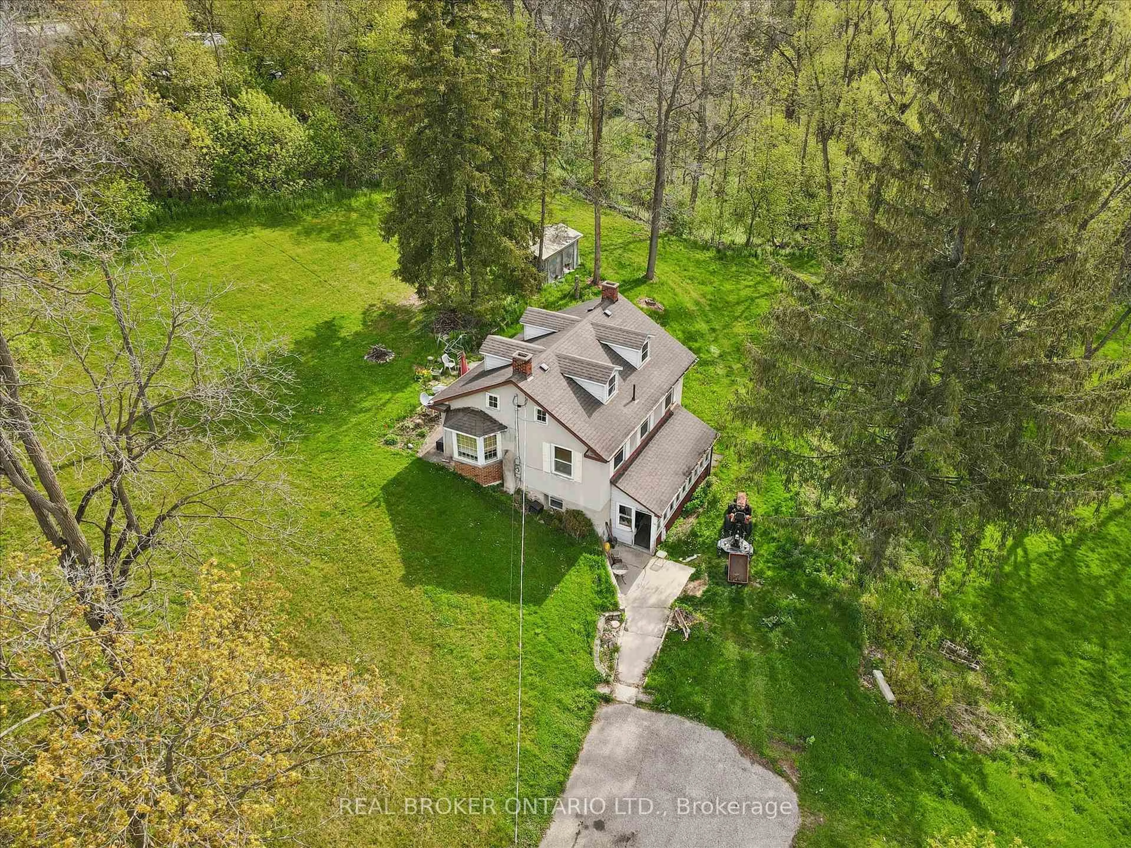 A pic from outside/outdoor area/front of a property/back of a property/a pic from drone, forest/trees view for 36 Elgin St, Woolwich Ontario N0B 1N0