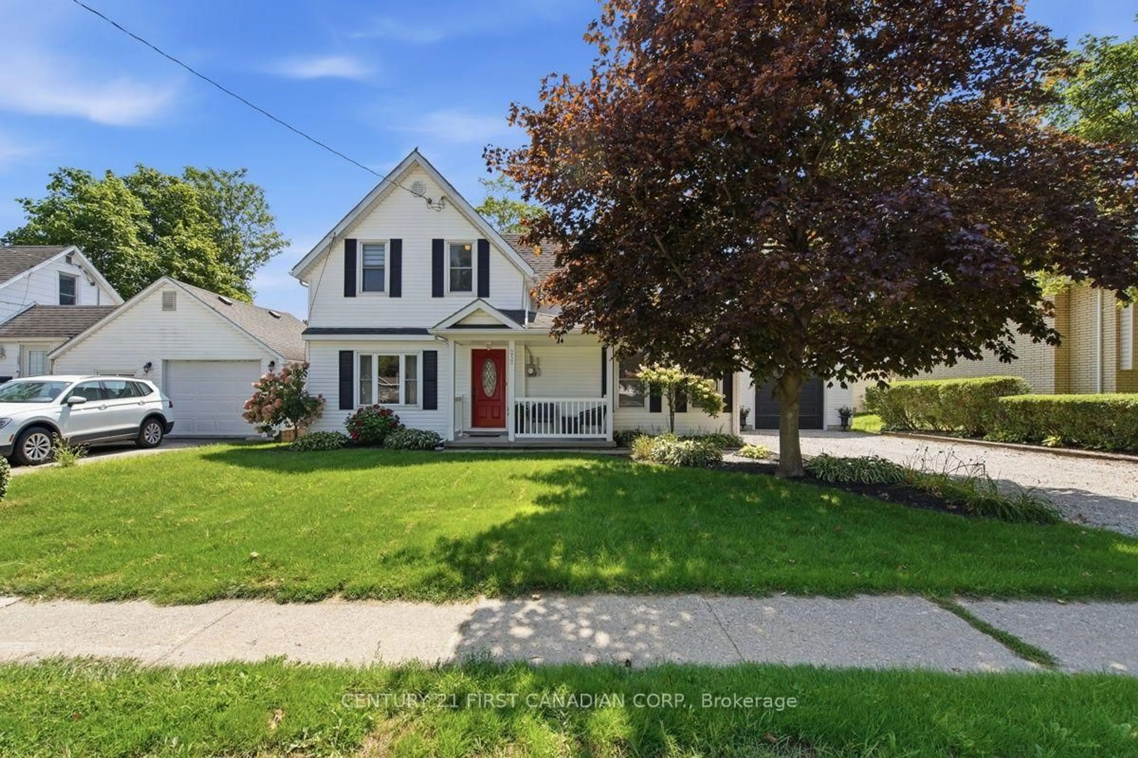 Home with vinyl exterior material, street for 212 MAIN St, West Elgin Ontario N0L 2P0