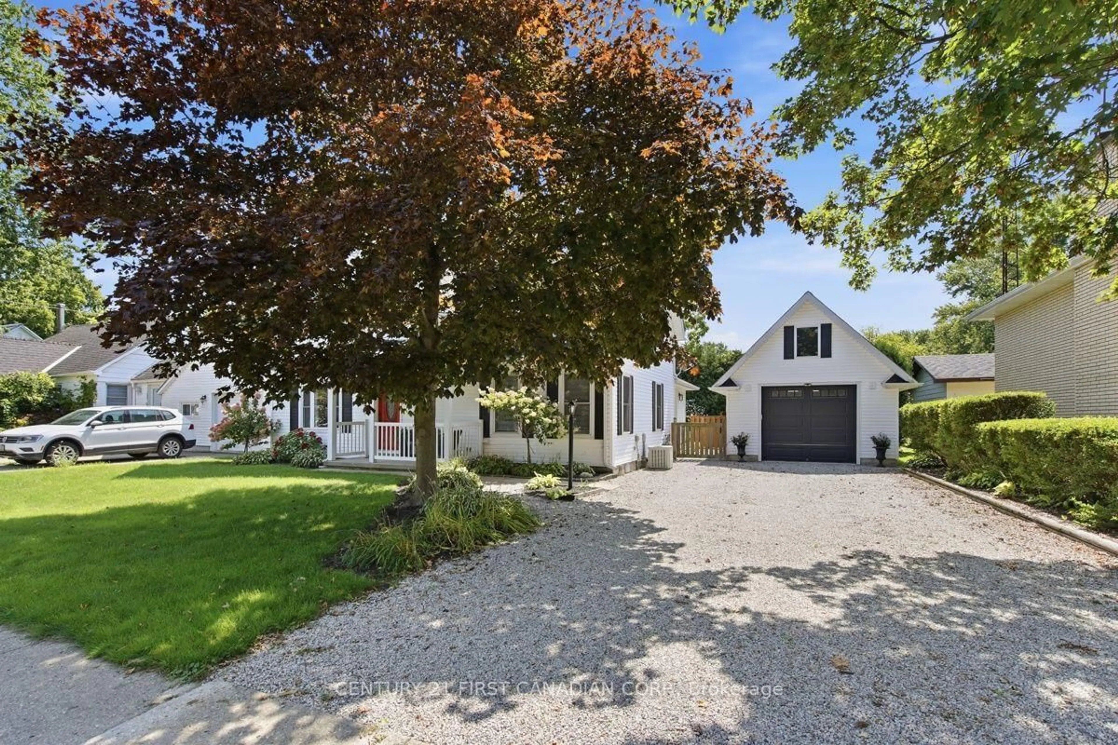 A pic from outside/outdoor area/front of a property/back of a property/a pic from drone, street for 212 MAIN St, West Elgin Ontario N0L 2P0