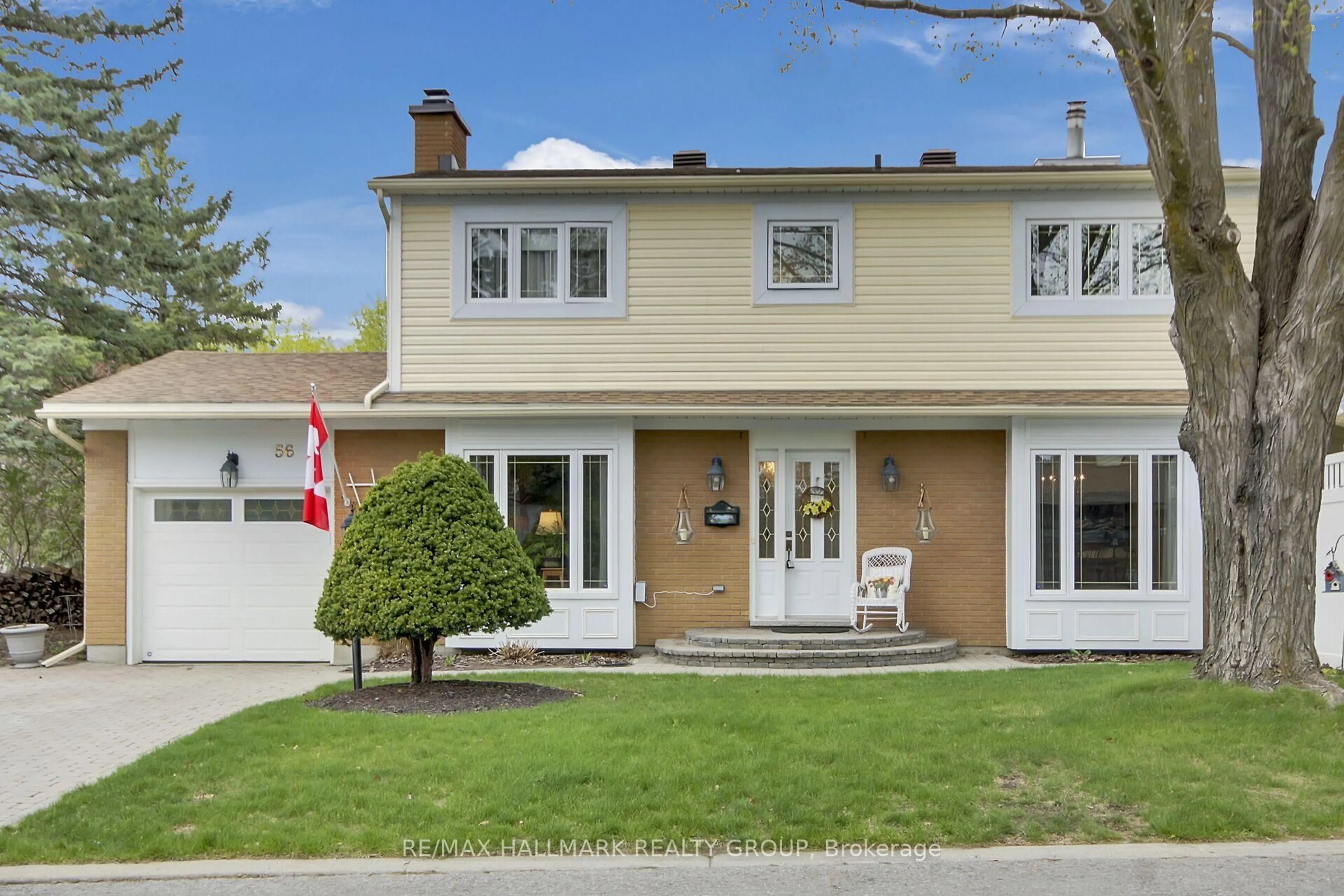 Home with vinyl exterior material, street for 56 Foxleigh Cres, Kanata Ontario K2M 1B7