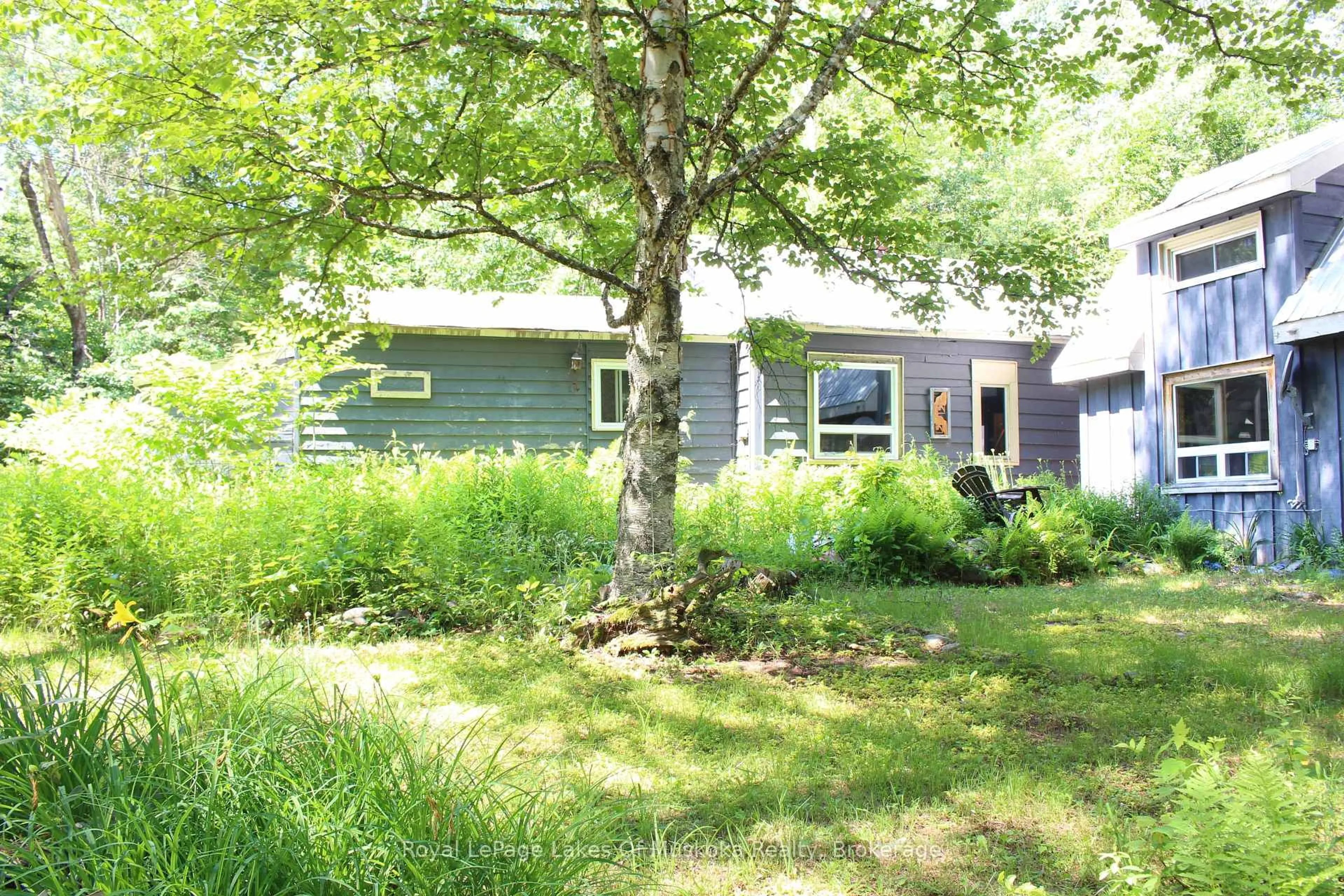 Home with vinyl exterior material, street for 2007 Brunel Rd, Huntsville Ontario P1H 2J3