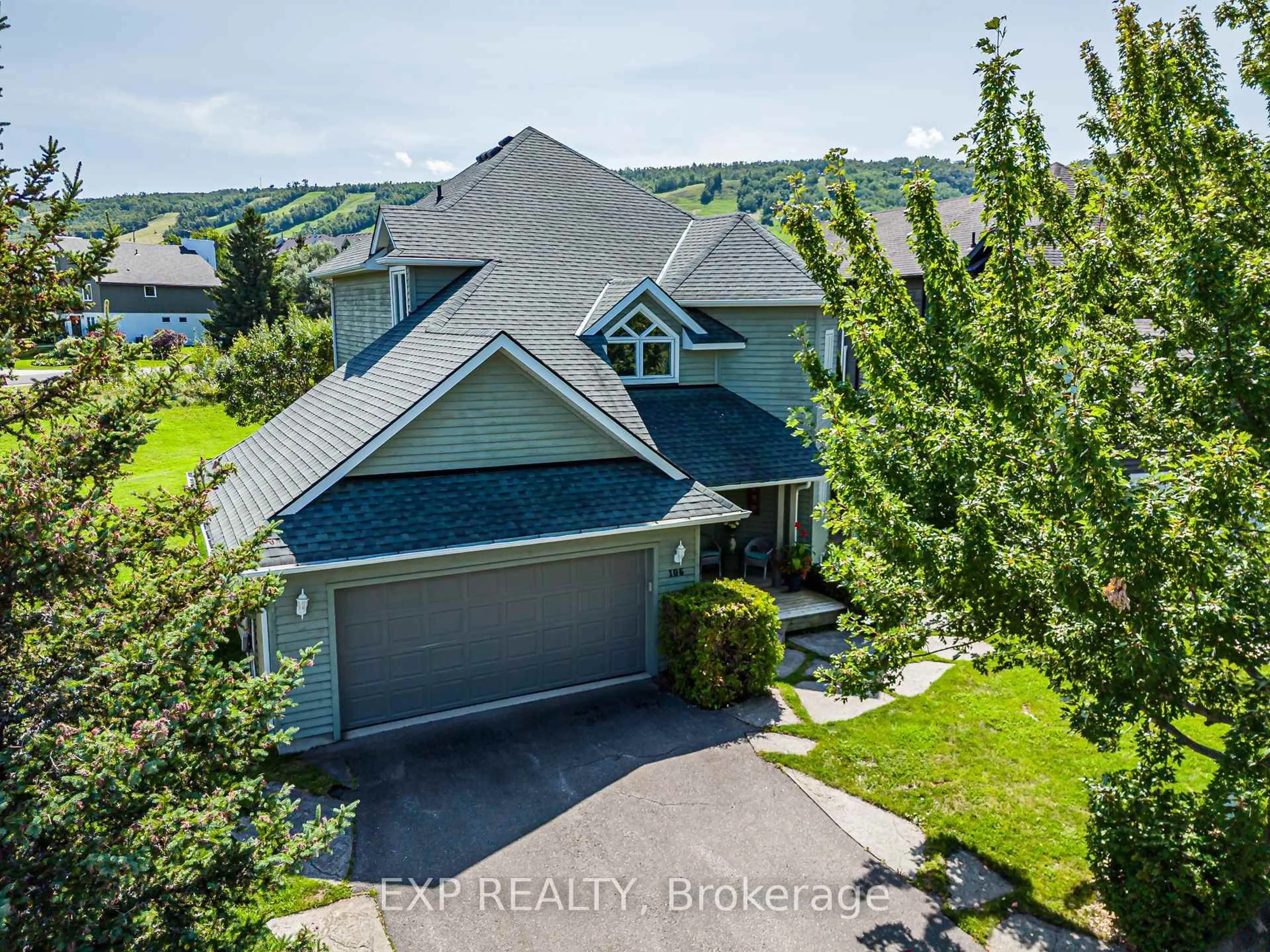 A pic from outside/outdoor area/front of a property/back of a property/a pic from drone, unknown for 106 Crossan Crt, Blue Mountains Ontario L9Y 0M3