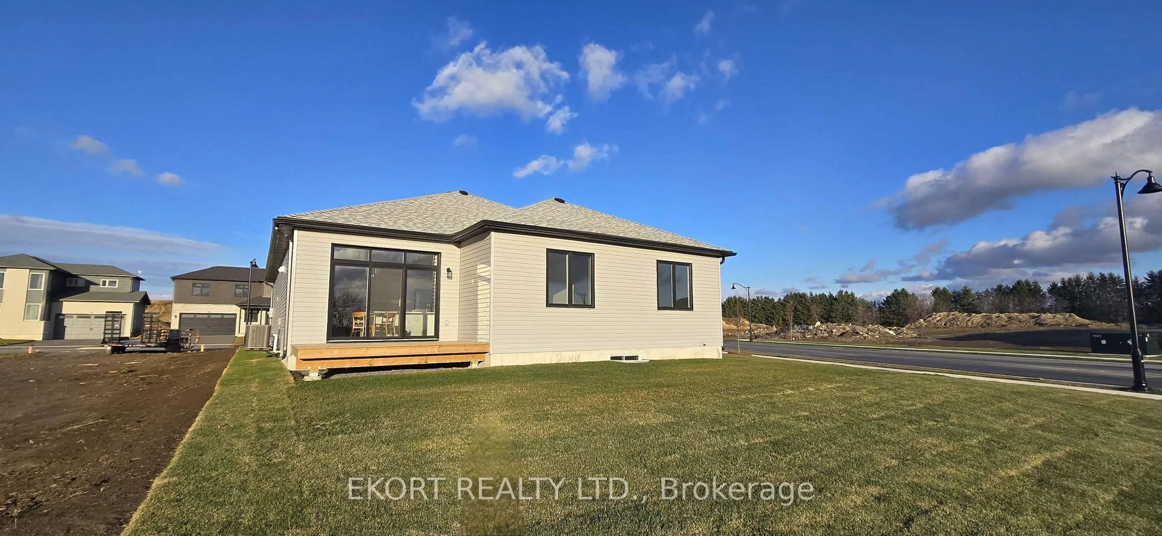A pic from outside/outdoor area/front of a property/back of a property/a pic from drone, water/lake/river/ocean view for 7 French St, Prince Edward County Ontario K0K 2T0
