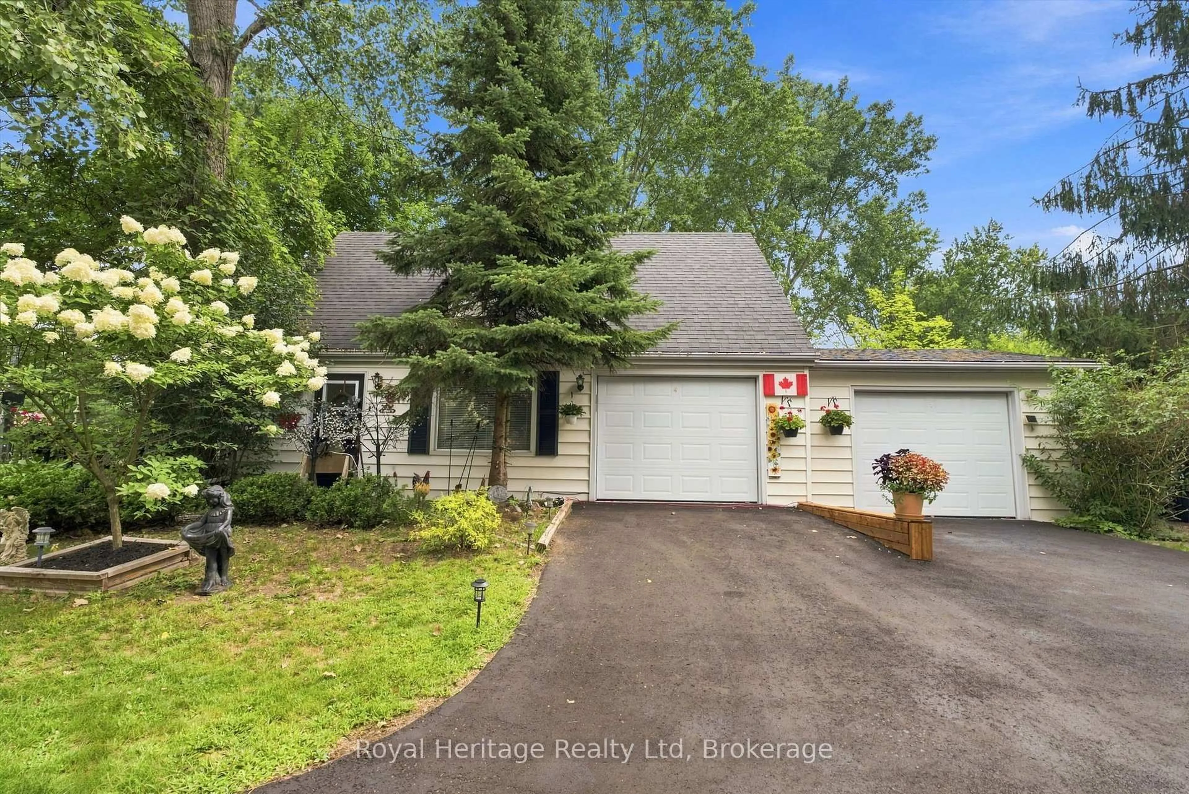 Home with vinyl exterior material, street for 421 River Rd, Corbyville Ontario K0K 1V0
