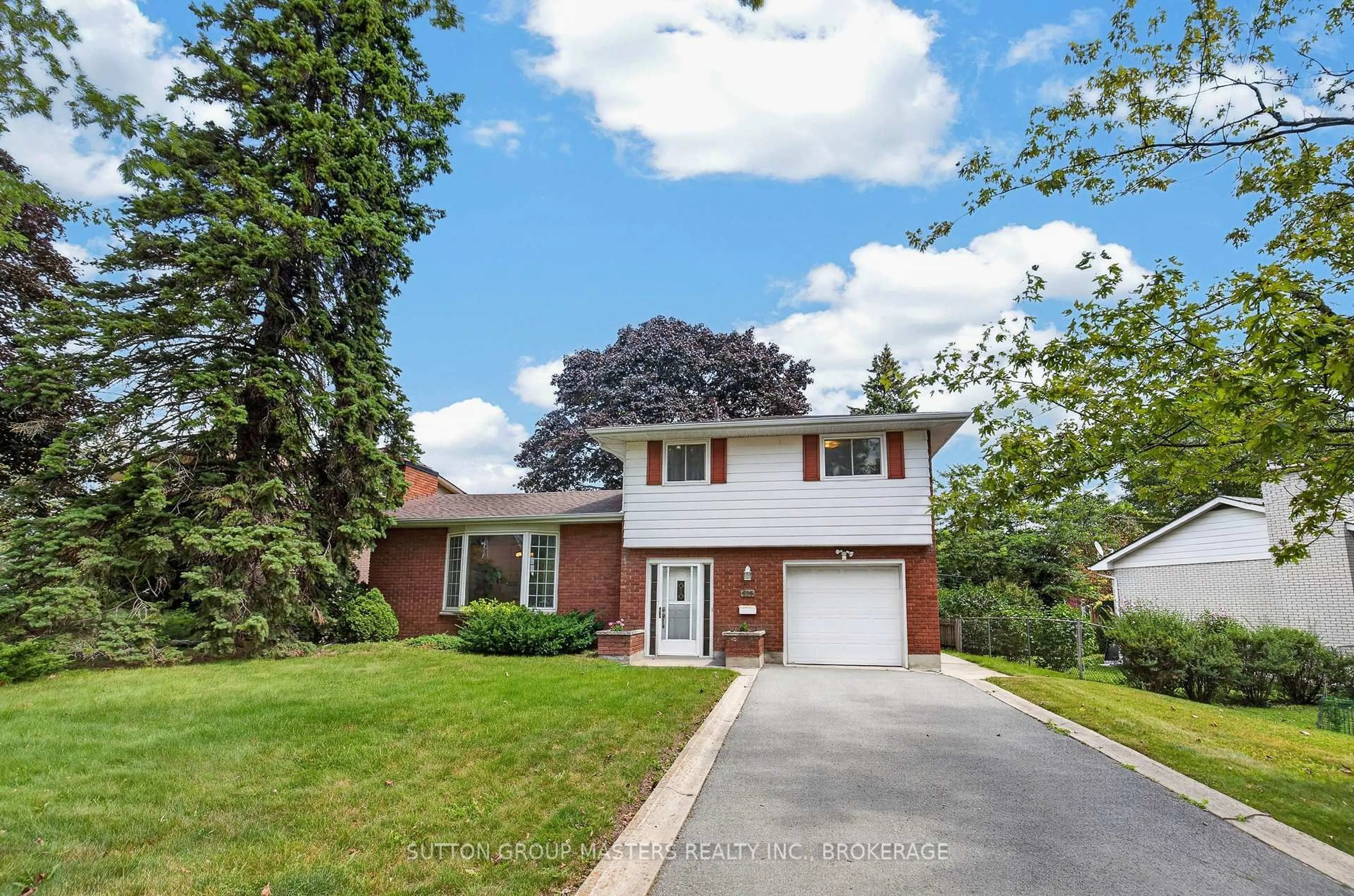 Home with brick exterior material, street for 197 Norman Rogers Dr, Kingston Ontario K7M 2R5