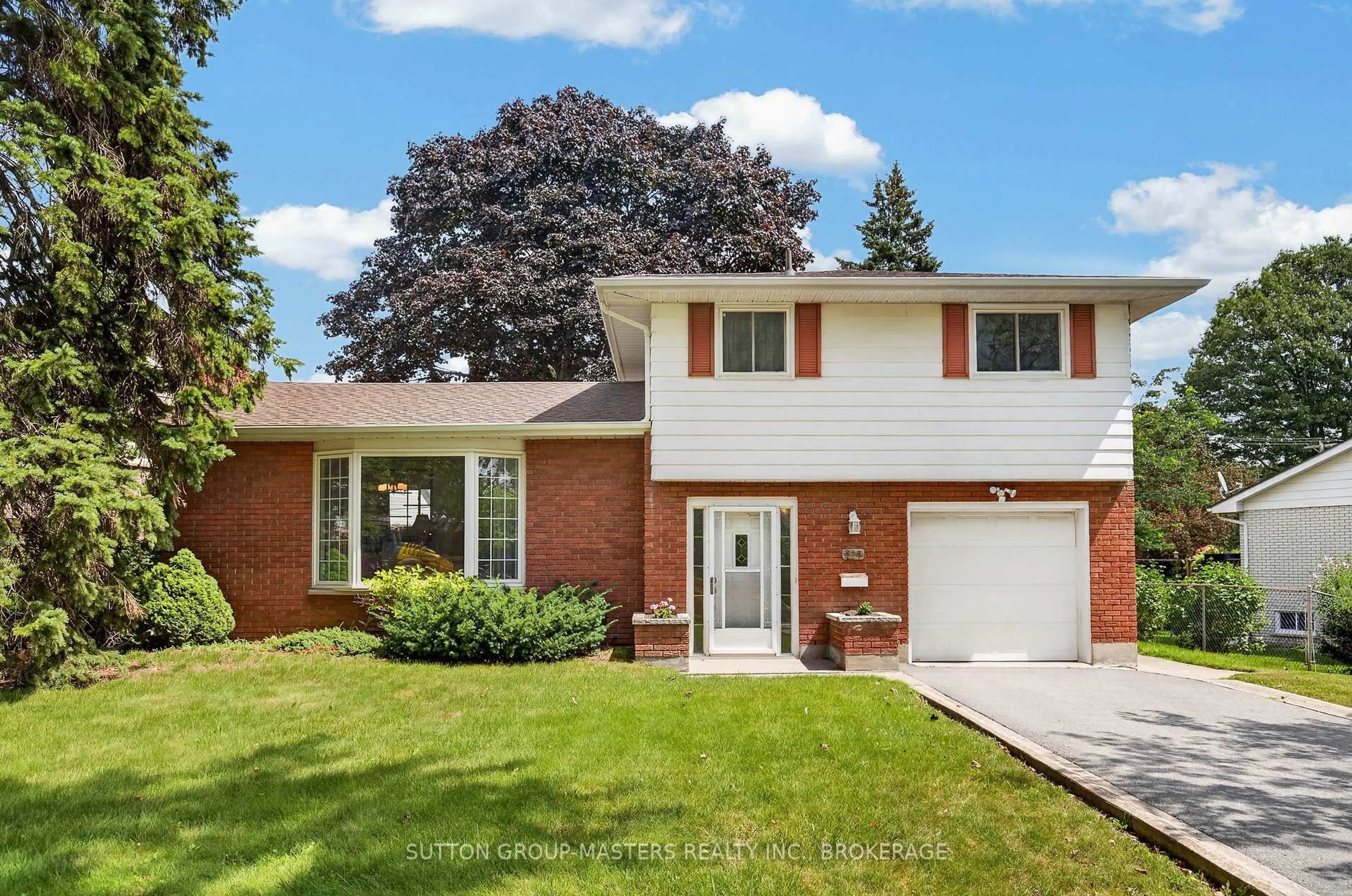 Home with brick exterior material, street for 197 Norman Rogers Dr, Kingston Ontario K7M 2R5
