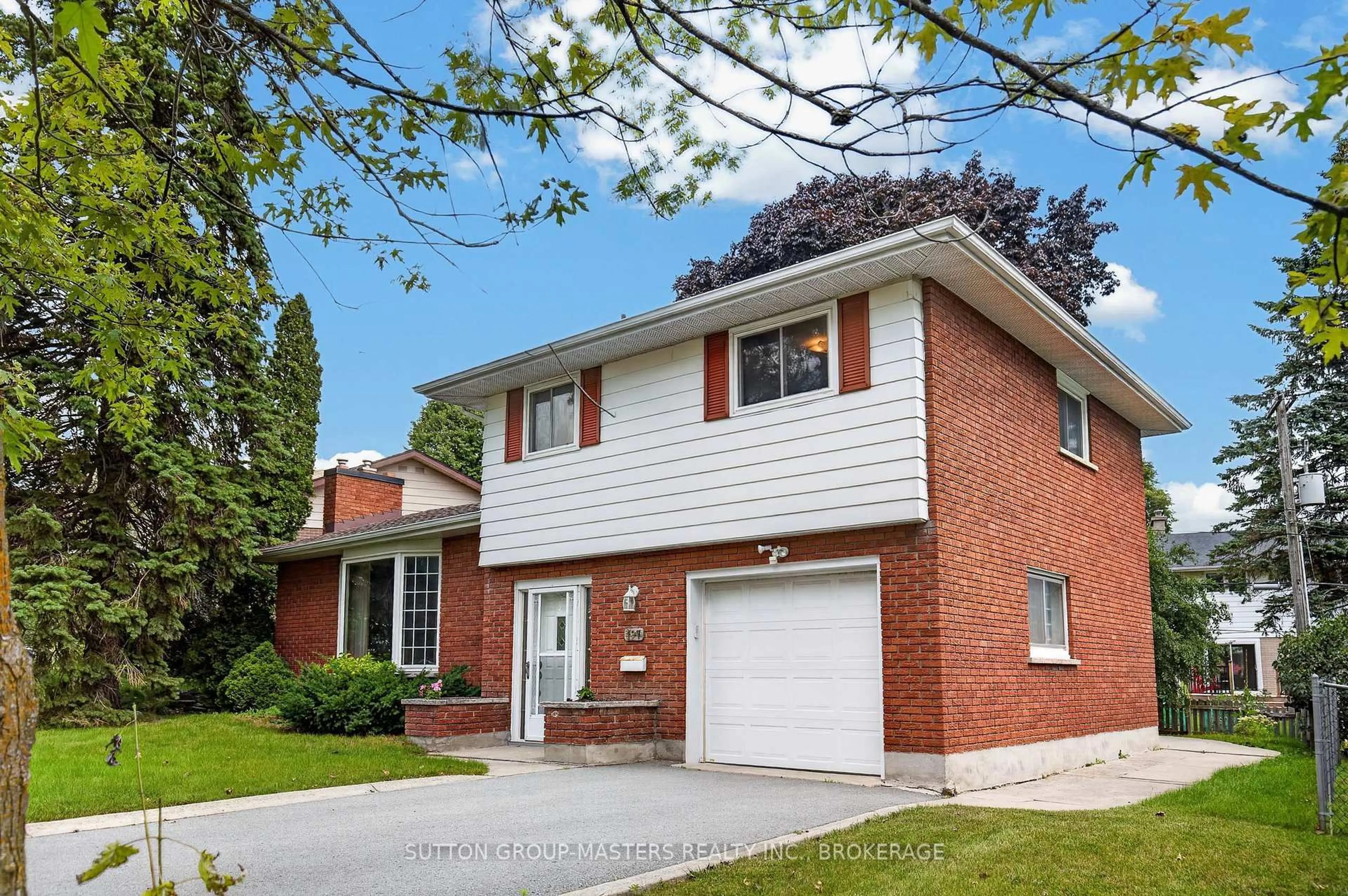 Home with brick exterior material, street for 197 Norman Rogers Dr, Kingston Ontario K7M 2R5