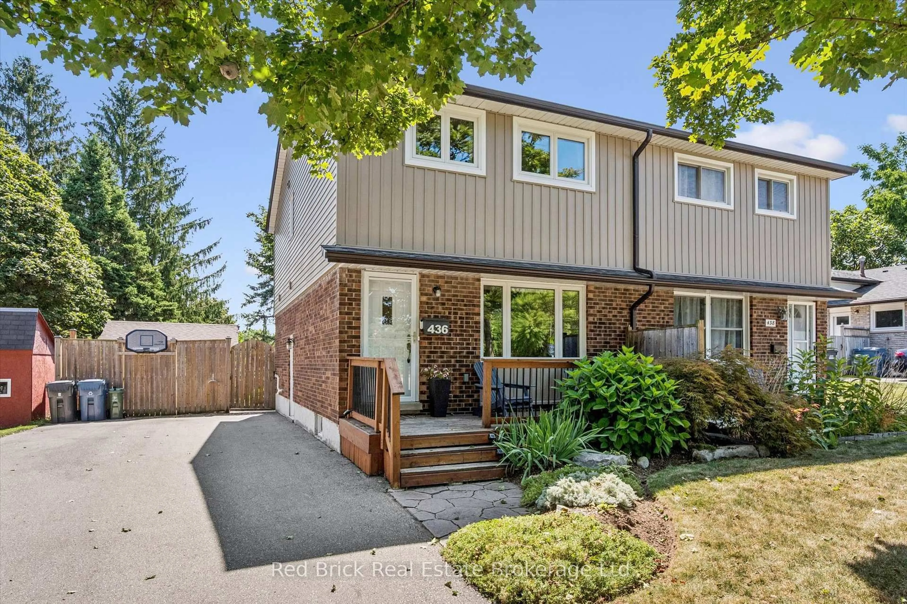 Home with vinyl exterior material, street for 436 Willow Rd, Guelph Ontario N1H 6S2