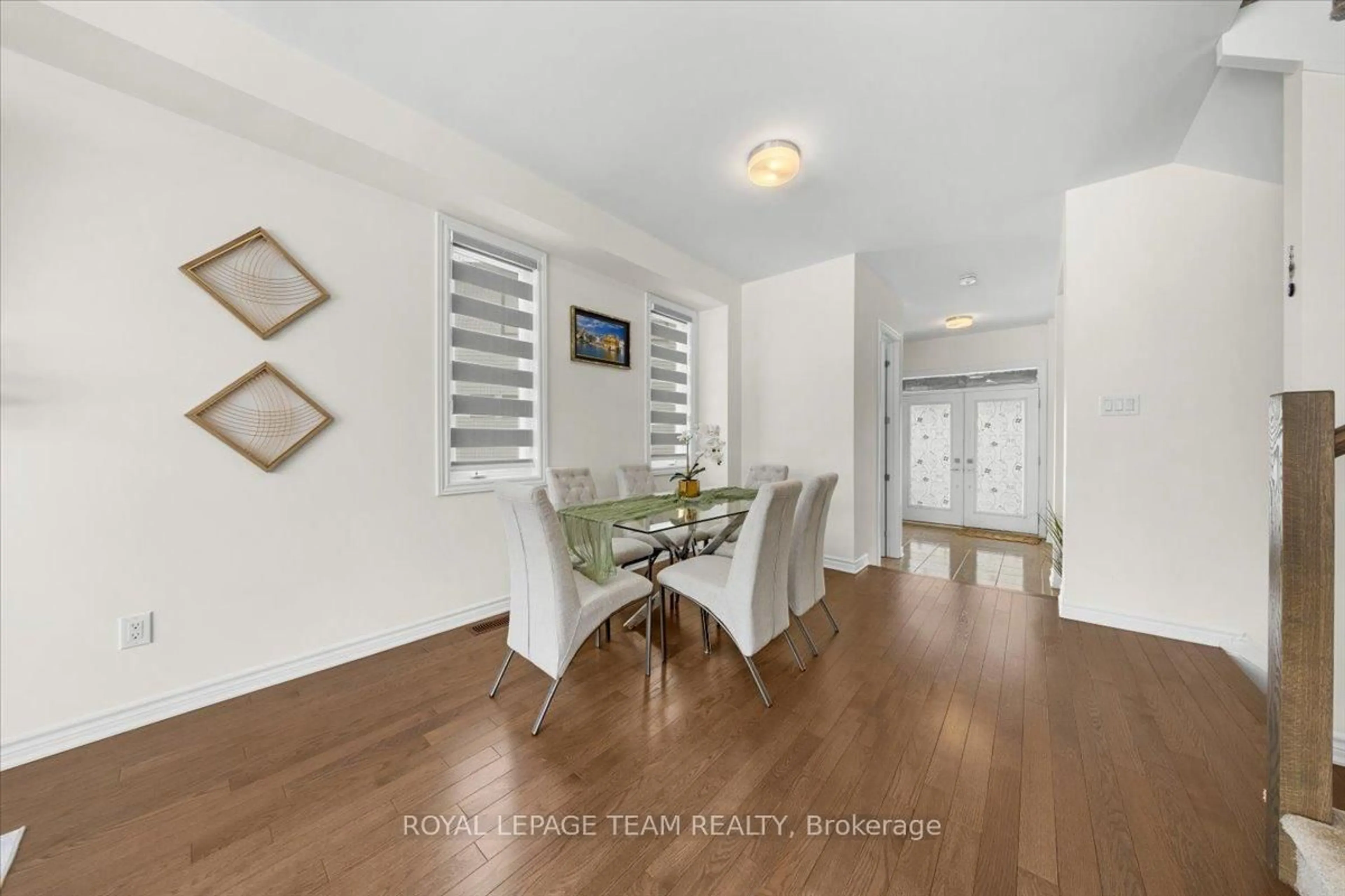 Dining room, wood/laminate floor for 290 Turnbuckle Cres, Ottawa Ontario K2J 7B7