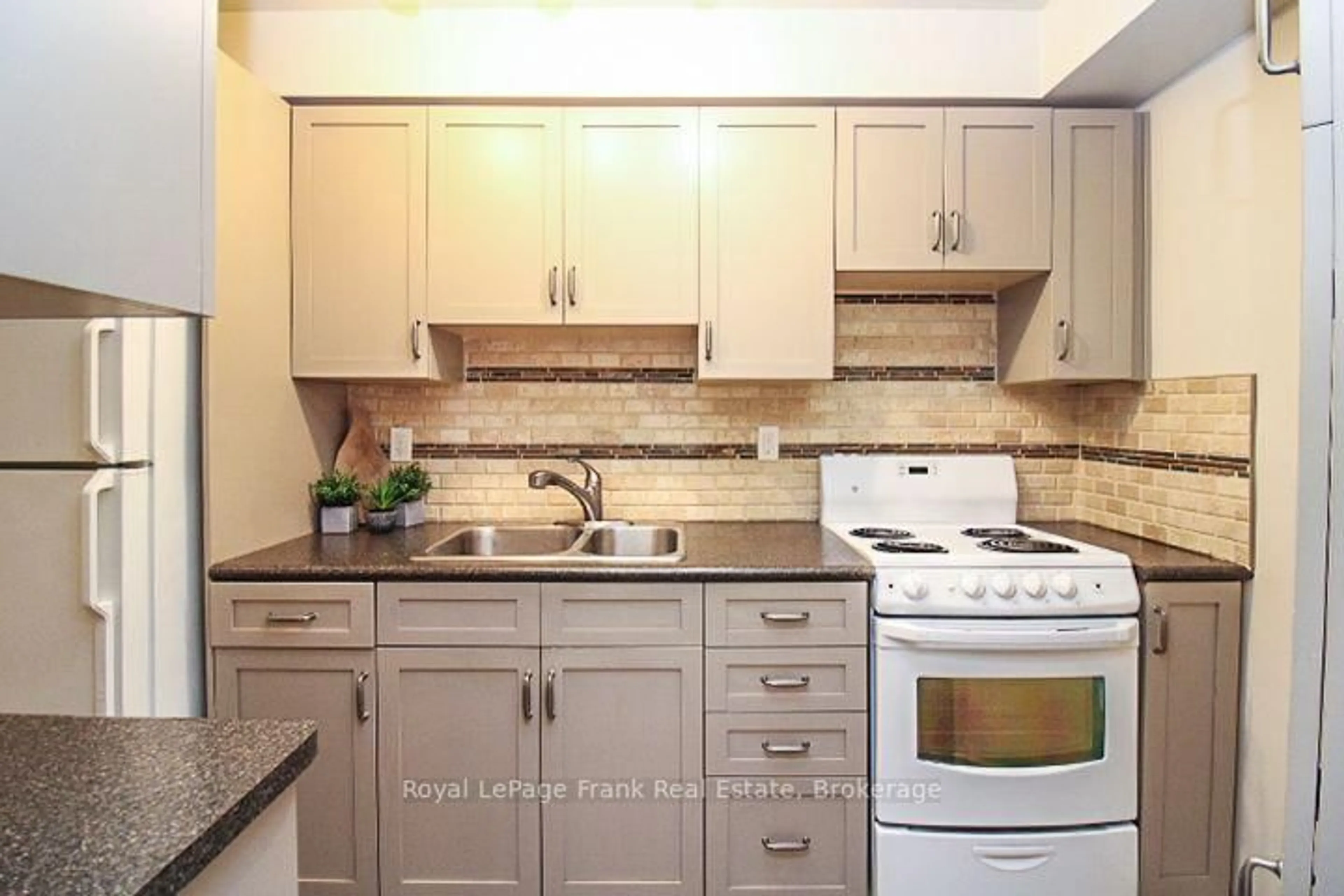 Standard kitchen, ceramic/tile floor for 921 Armour Rd #216, Peterborough Ontario K9H 7K5