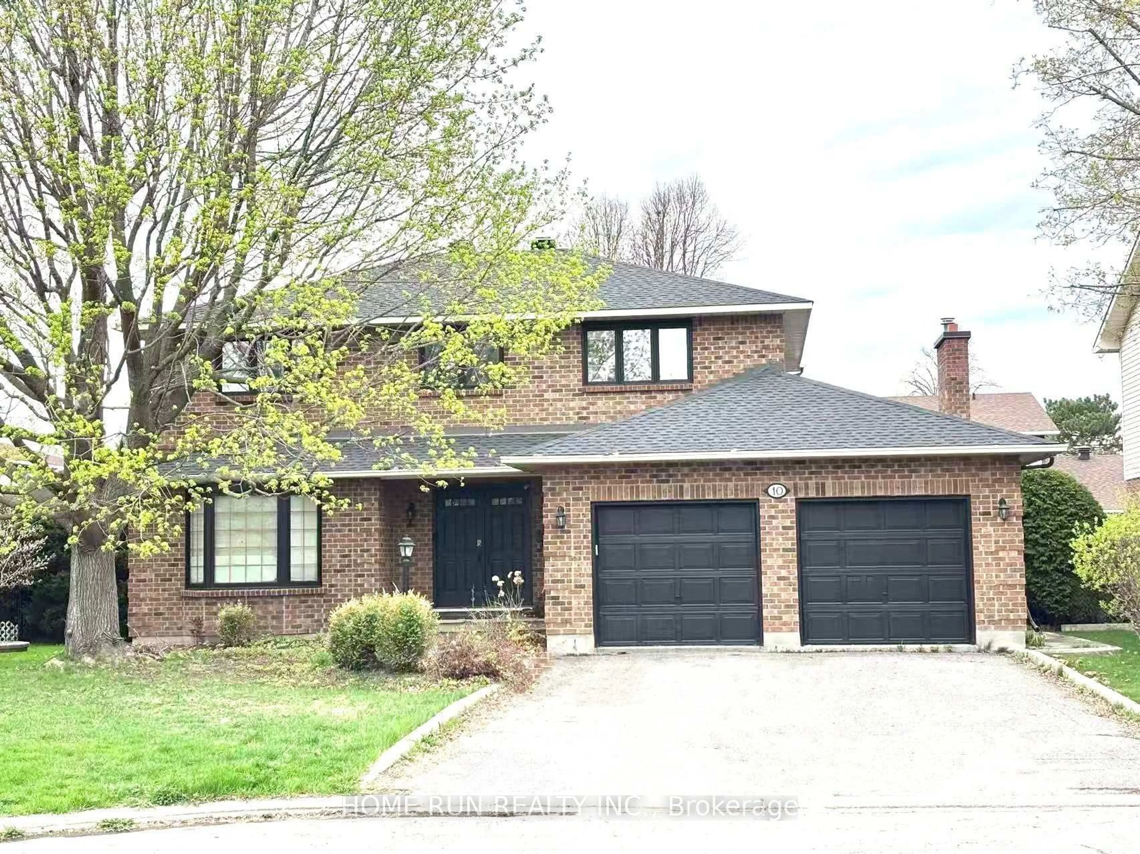 Home with brick exterior material, street for 10 Westchester Crt, Barrhaven Ontario K2J 3P9
