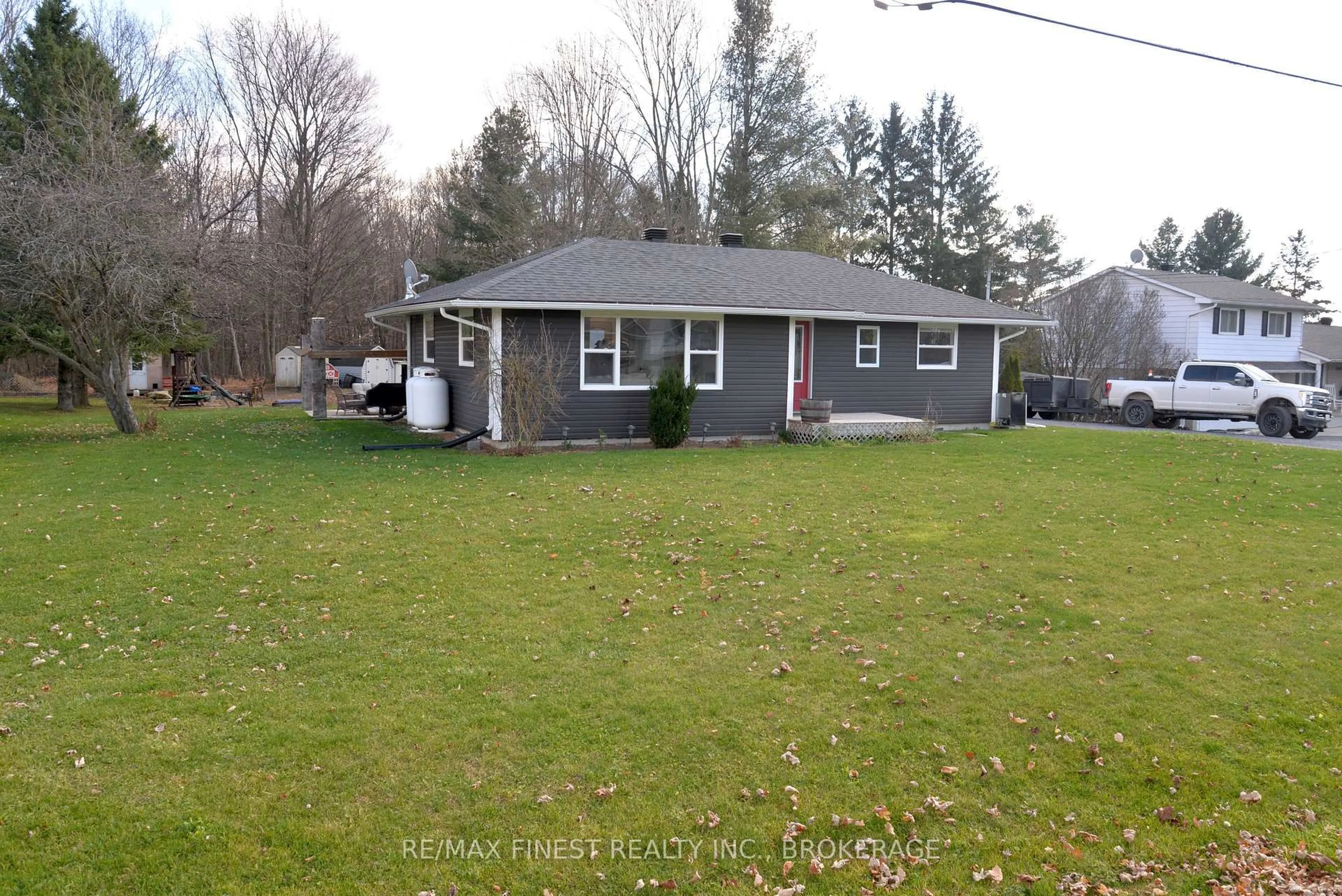 A pic from outside/outdoor area/front of a property/back of a property/a pic from drone, street for 3616 Perth Rd, Inverary Ontario K0H 1X0