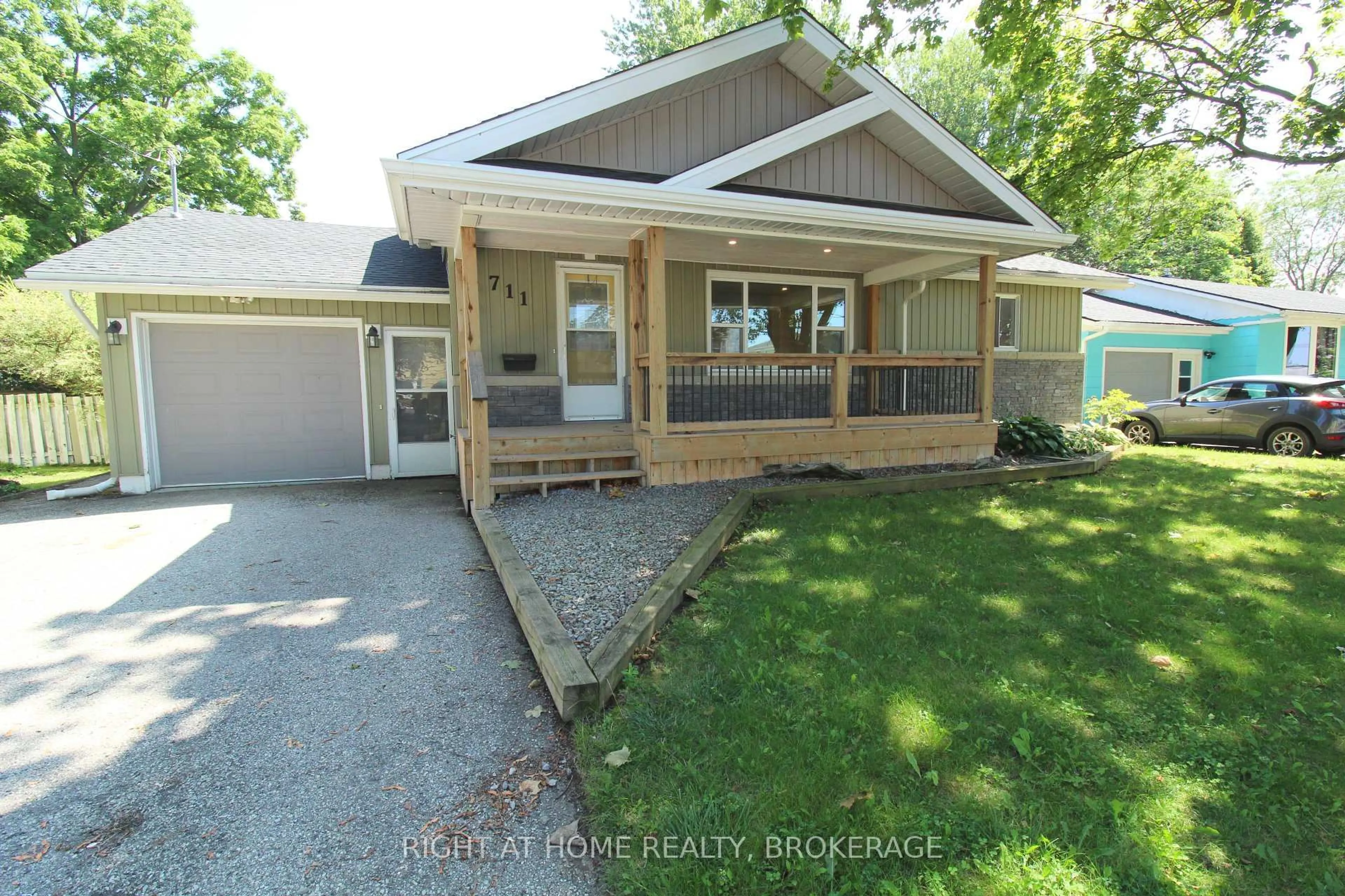 Home with vinyl exterior material, street for 711 JOHN St, Haldimand Ontario N1A 2R4