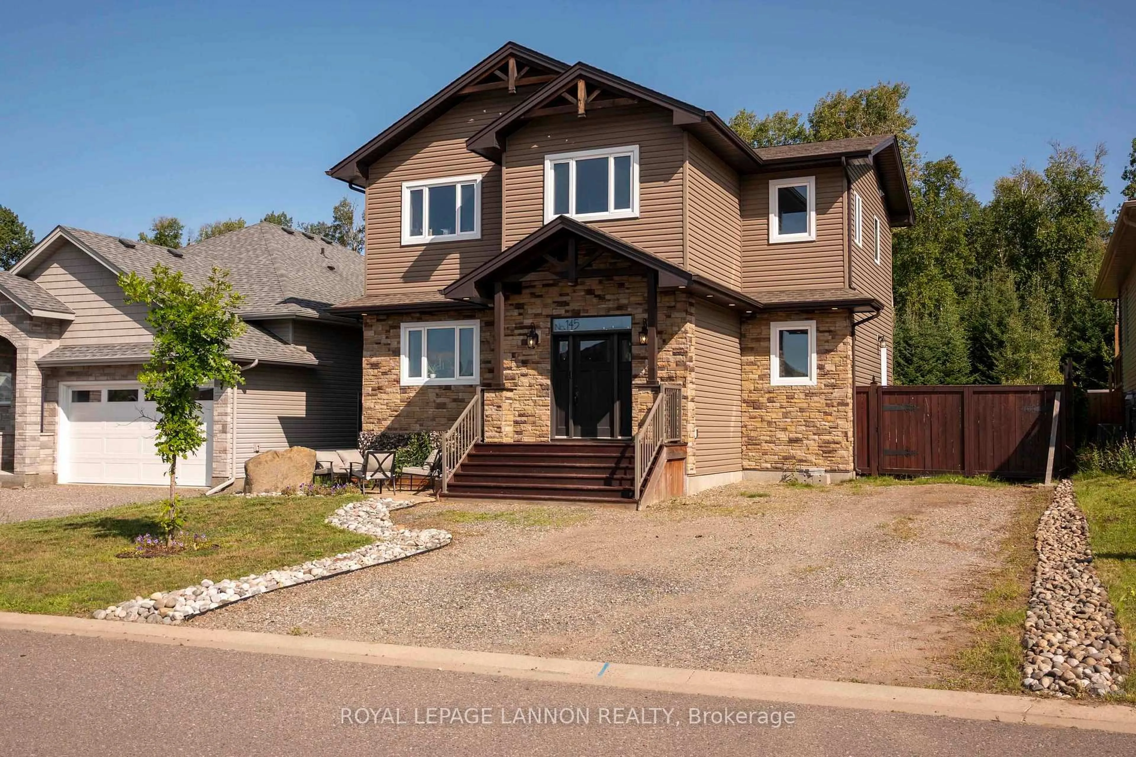 Home with brick exterior material, street for 145 Dogwood Cres, Thunder Bay Ontario P7G 2N9