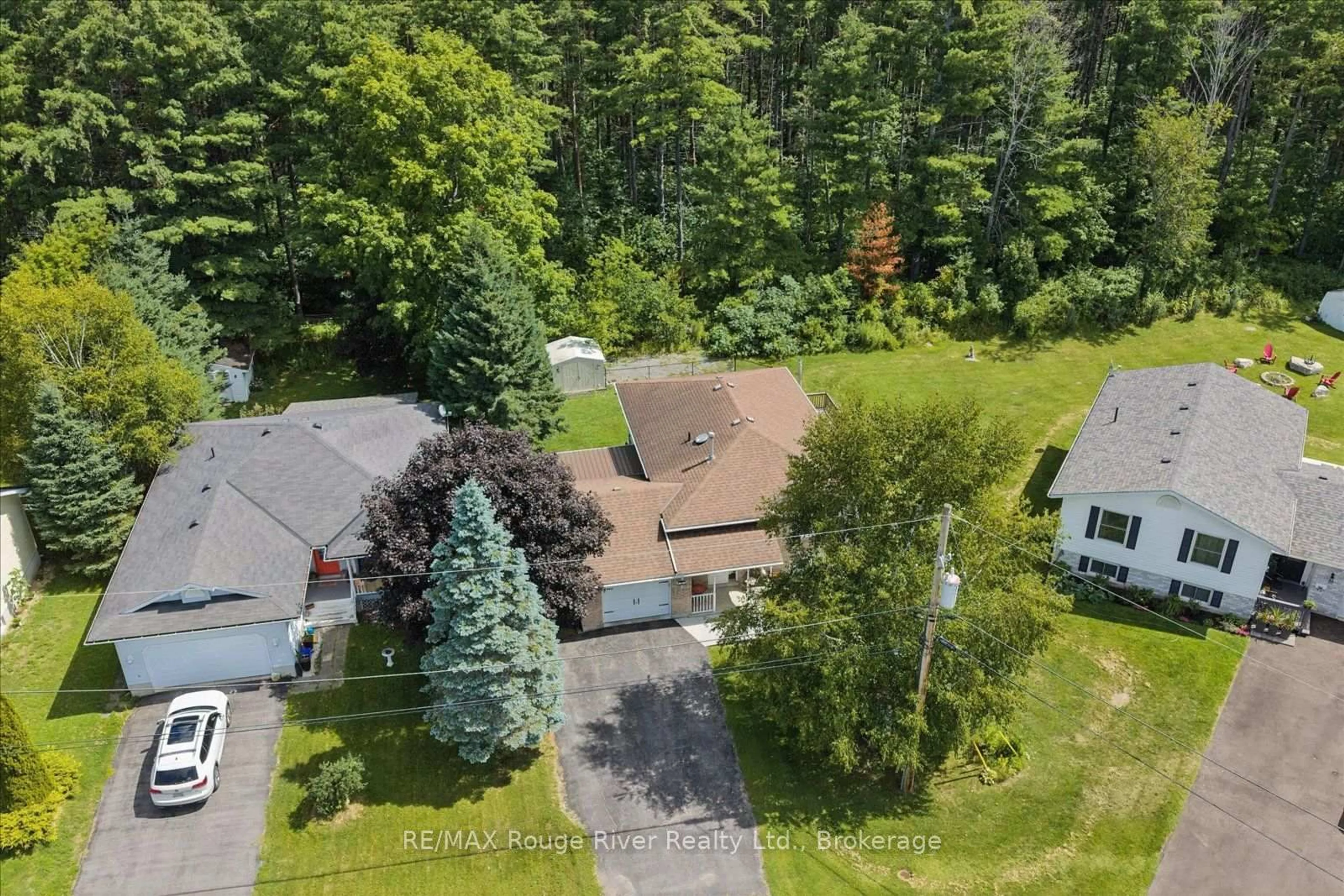A pic from outside/outdoor area/front of a property/back of a property/a pic from drone, forest/trees view for 32 South Maloney St, Limoges Ontario K0K 2M0