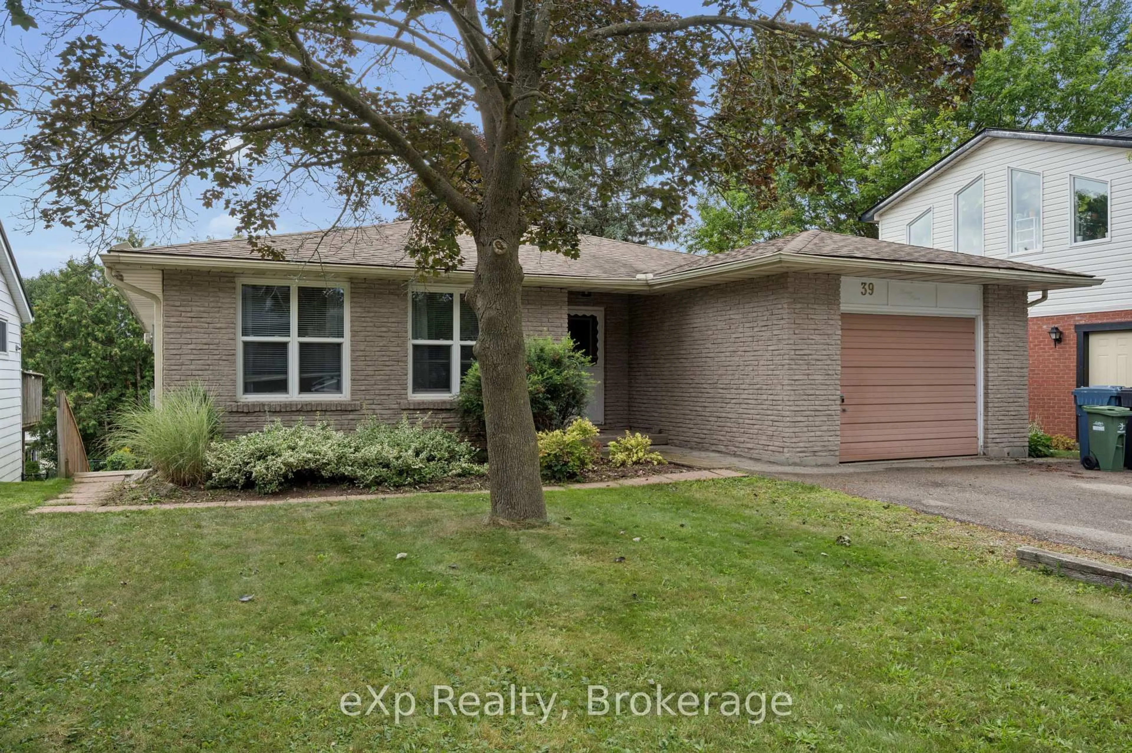 Home with brick exterior material, street for 39 Keats Cres, Guelph Ontario N1G 3B1