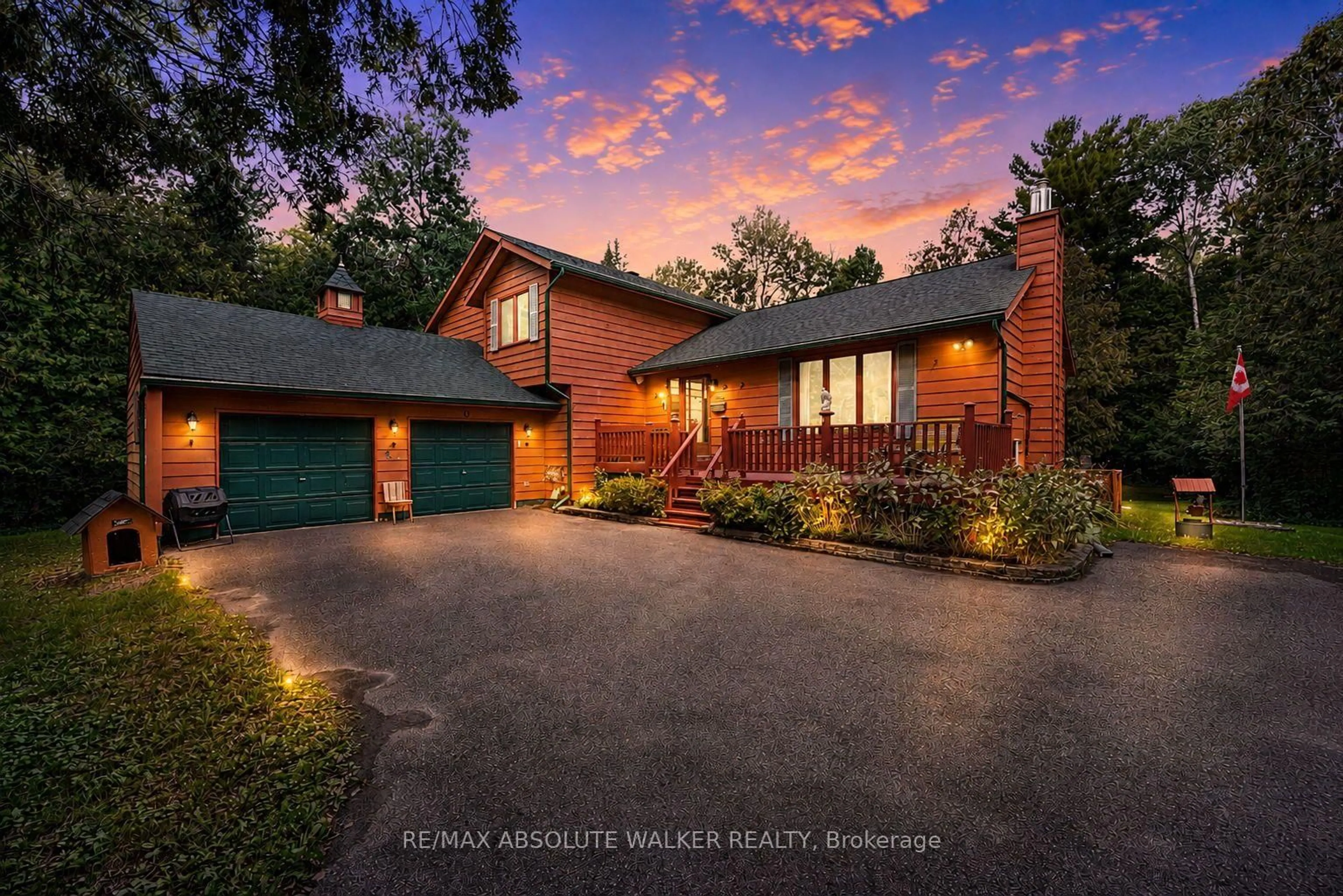 A pic from outside/outdoor area/front of a property/back of a property/a pic from drone, water/lake/river/ocean view for 219 Deerwood Dr, Kinburn Ontario K0A 2H0