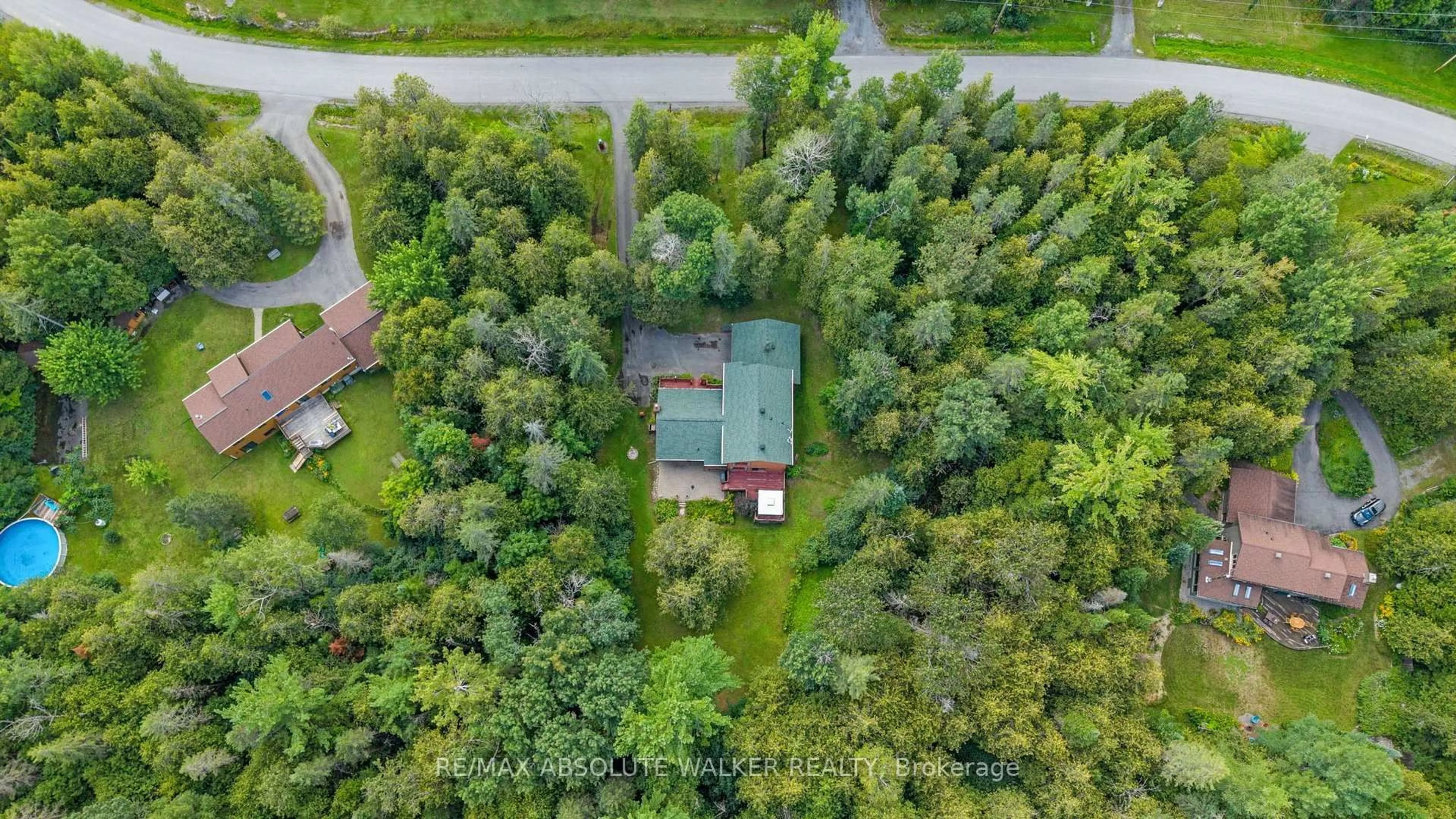 A pic from outside/outdoor area/front of a property/back of a property/a pic from drone, forest/trees view for 219 Deerwood Dr, Kinburn Ontario K0A 2H0